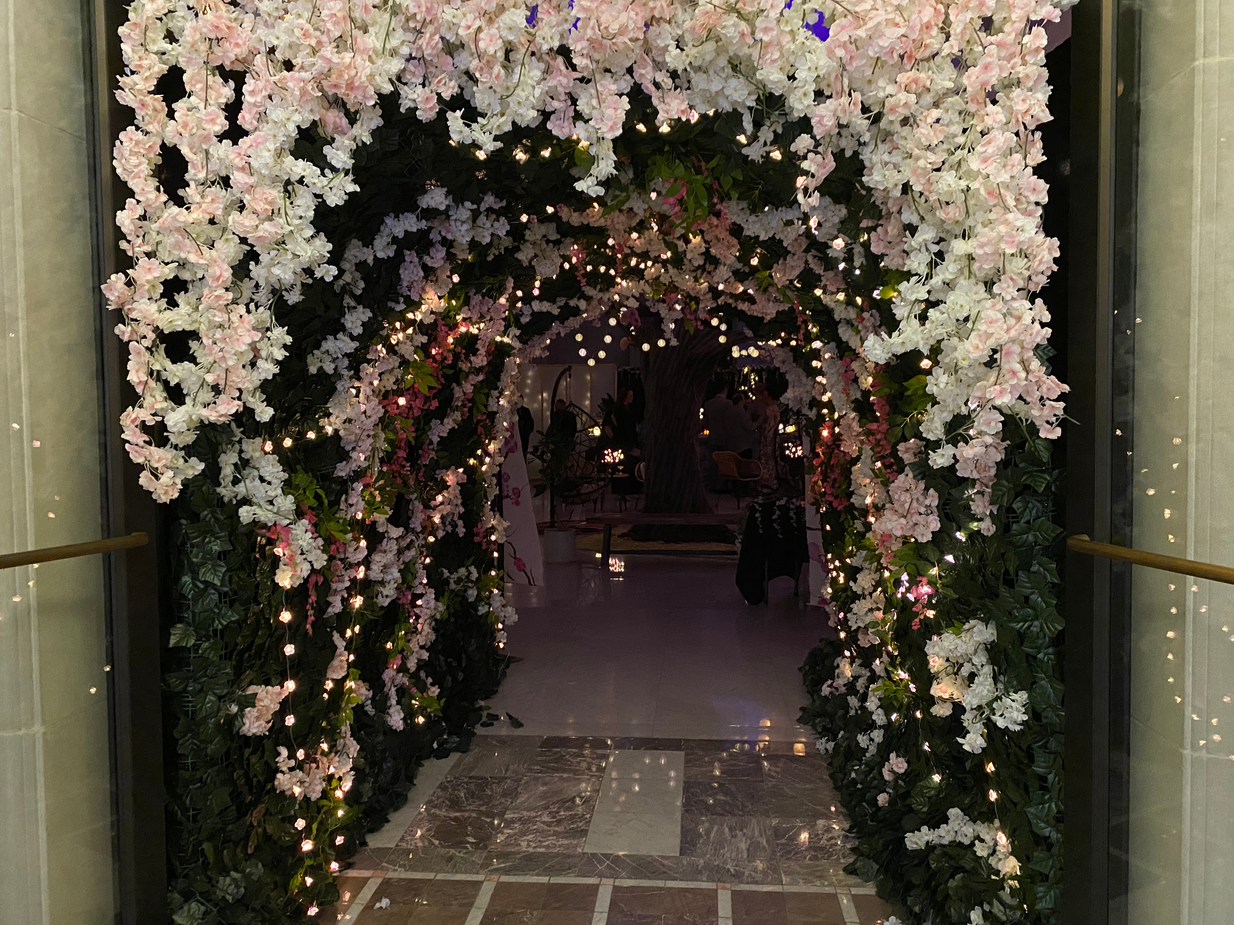 Scenes from inside Downtown Partnership’s Cherry Blossom Pop-Up Bar, held in a long-vacant bank building.