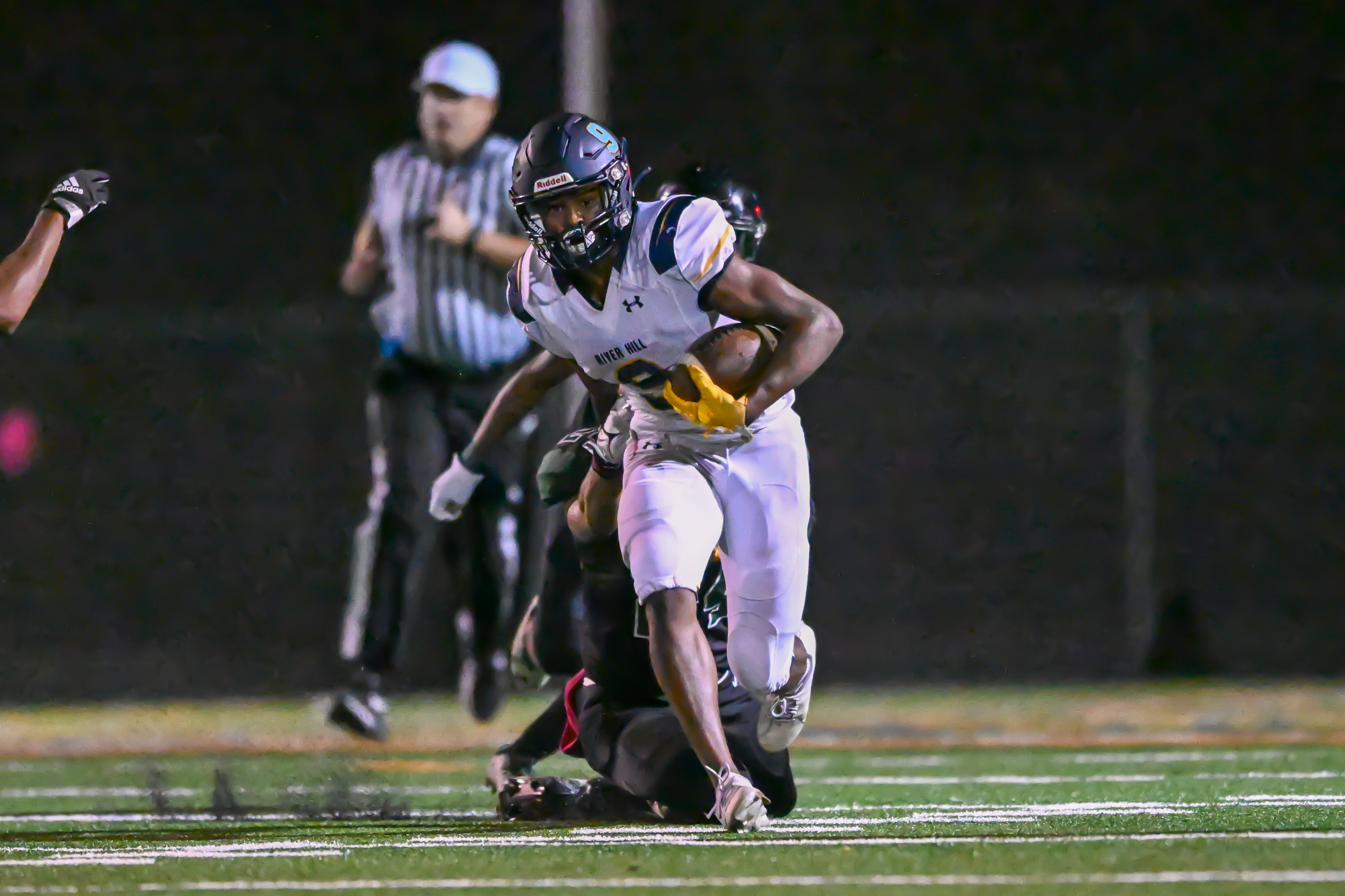 River Hill running back carries the ball during Friday's Howard County football match with Atholton.
