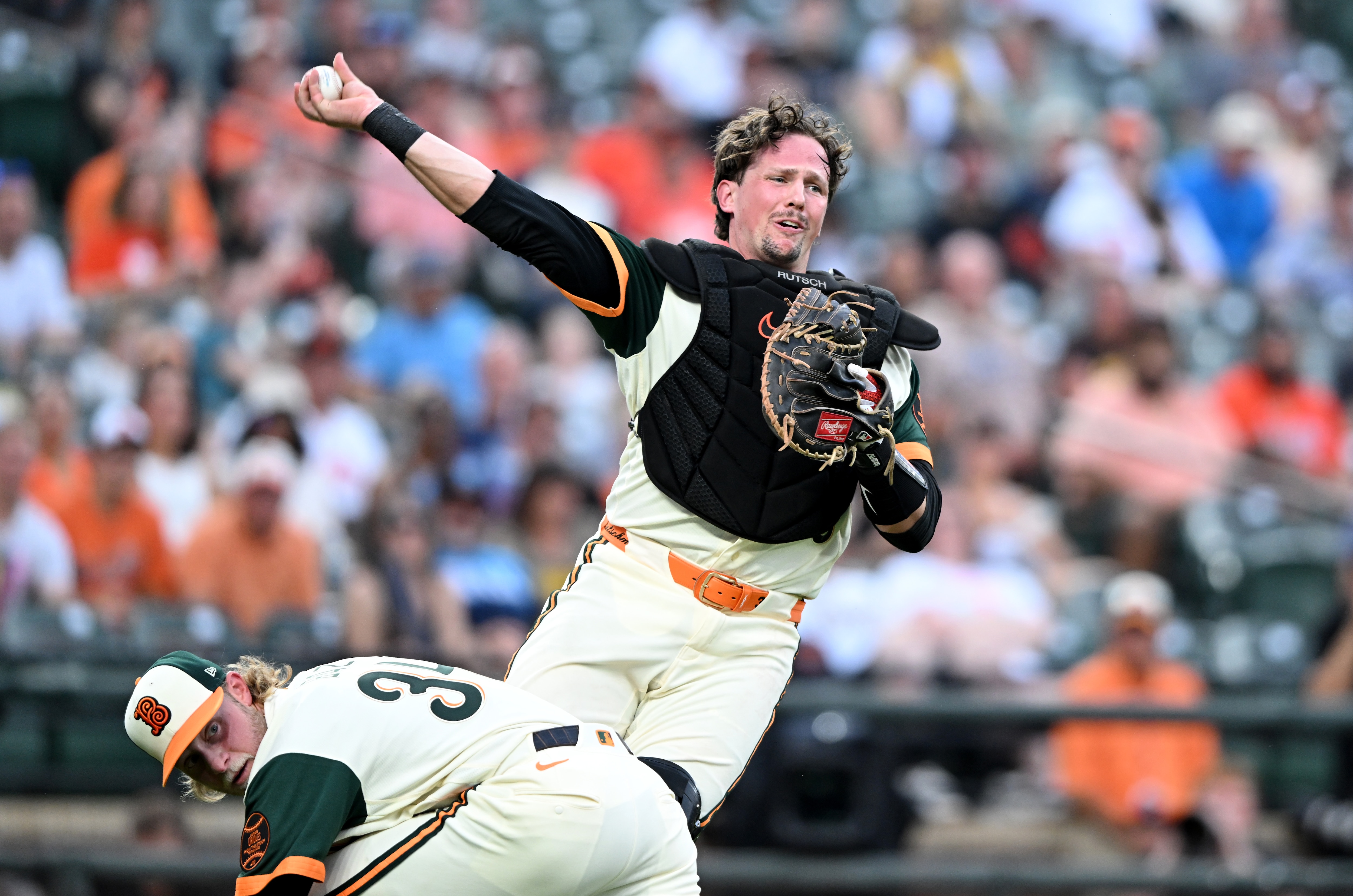 Baltimore Orioles catcher Adley Rutschman throws out a San Diego Padres baserunner in the second inning at Camden Yards on June 12.