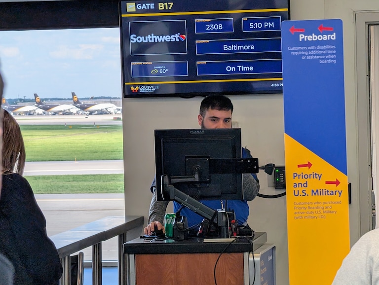 A Southwest Airlines gate attendant prepares to board passengers on April 19, 2026 in Louisville, Kentucky, for a flight to Baltimore-Washington International Airport.