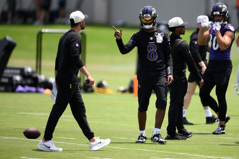 Baltimore Ravens quarterback Lamar Jackson (8) gestures during NFL football practice, Wednesday, June 10, 2026, in Owings Mills, Md.