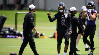 Baltimore Ravens quarterback Lamar Jackson (8) gestures during NFL football practice, Wednesday, June 10, 2026, in Owings Mills, Md.