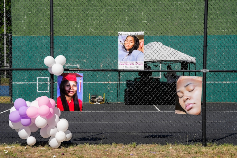 Photos of Aaliya Gonzalez, a victim of the Brooklyn Homes shooting, decorate a fence at Sawmill Creek Park in Glen Burnie on July 2, 2024.