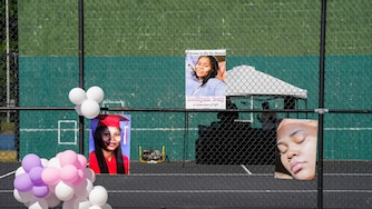Photos of Aaliya Gonzalez, a victim of the Brooklyn Homes shooting, decorate a fence at Sawmill Creek Park in Glen Burnie on July 2, 2024.