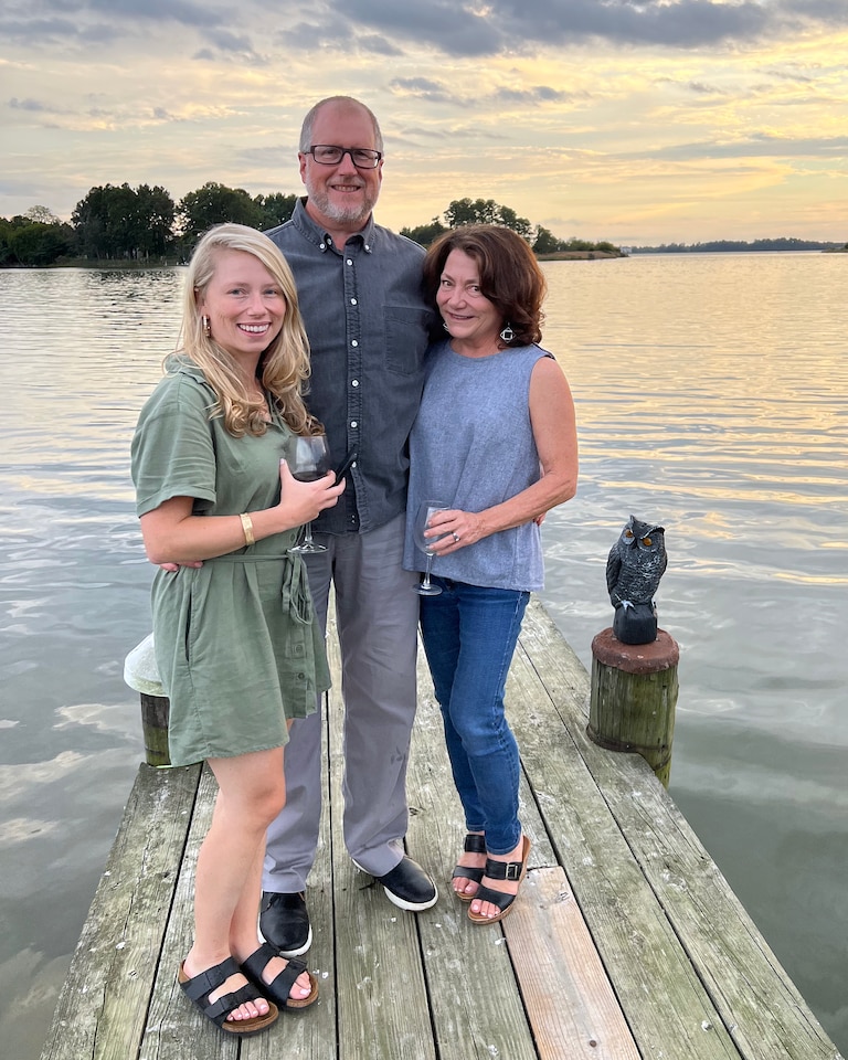 Brent Burkhardt, center, with Alex and Andrea on their dock in Trappe.