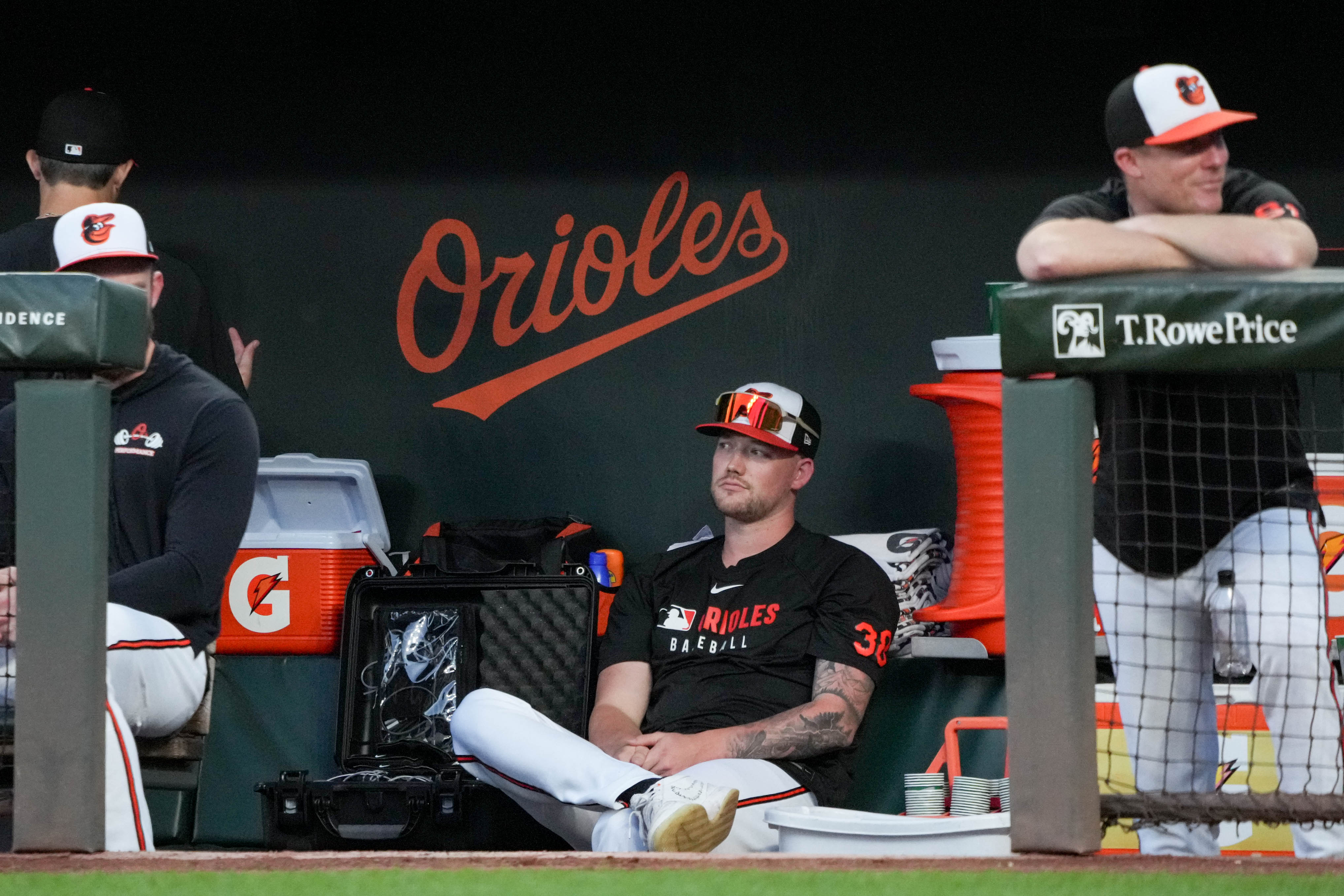 Kyle Bradish watches from the dugout in the third inning of a game against the Boston Red Sox on Monday.
