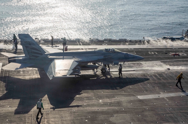 This image provided by U.S. Central Command shows an F/A-18E Super Hornet preparing to launch from the USS Abraham Lincoln (CVN 72) in support of Operation Epic Fury, on Saturday, Feb. 28, 2026.