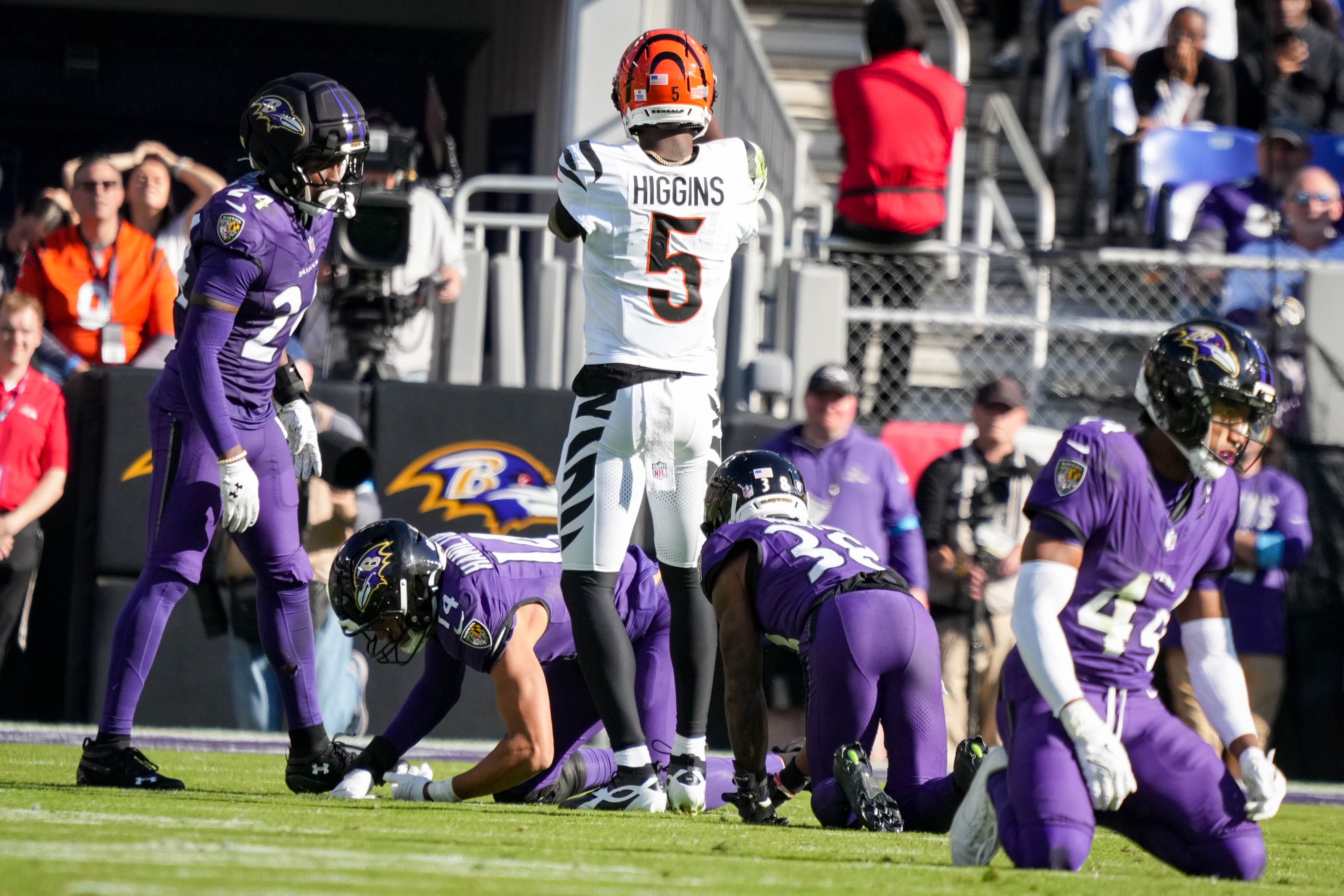 Wide receiver Tee Higgins celebrates a first down as the Bengals brought the Ravens to their knees in the fourth quarter Sunday.