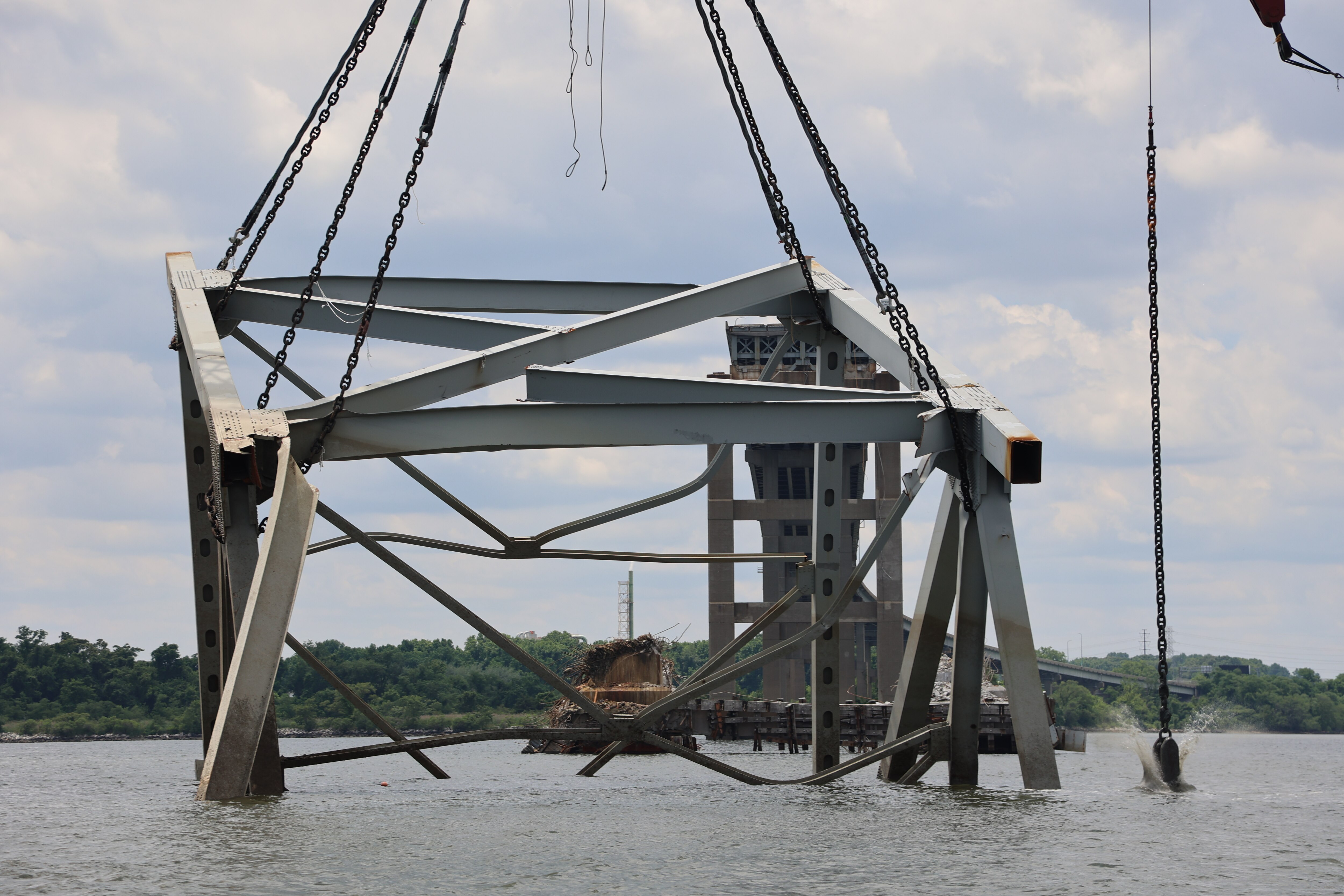 Salvage crews successfully removed the final large steel truss segment of the fallen Key Bridge on June 3-4.