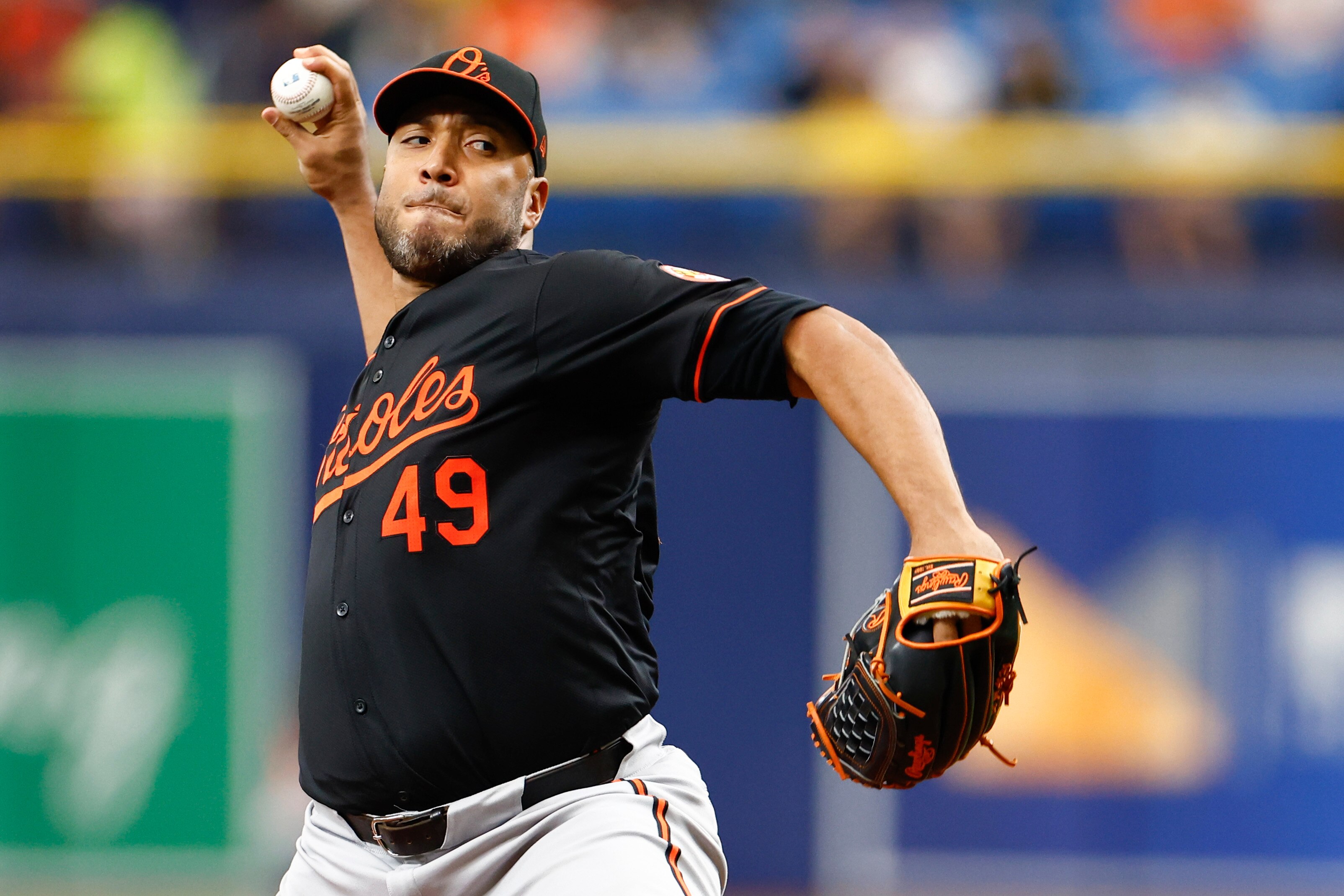ST PETERSBURG, FLORIDA - AUGUST 11: Albert Suárez #49 of the Baltimore Orioles throws a pitch during the first inning against the Tampa Bay Rays at Tropicana Field on August 11, 2024 in St Petersburg, Florida. (Photo by Douglas P. DeFelice/Getty Images)