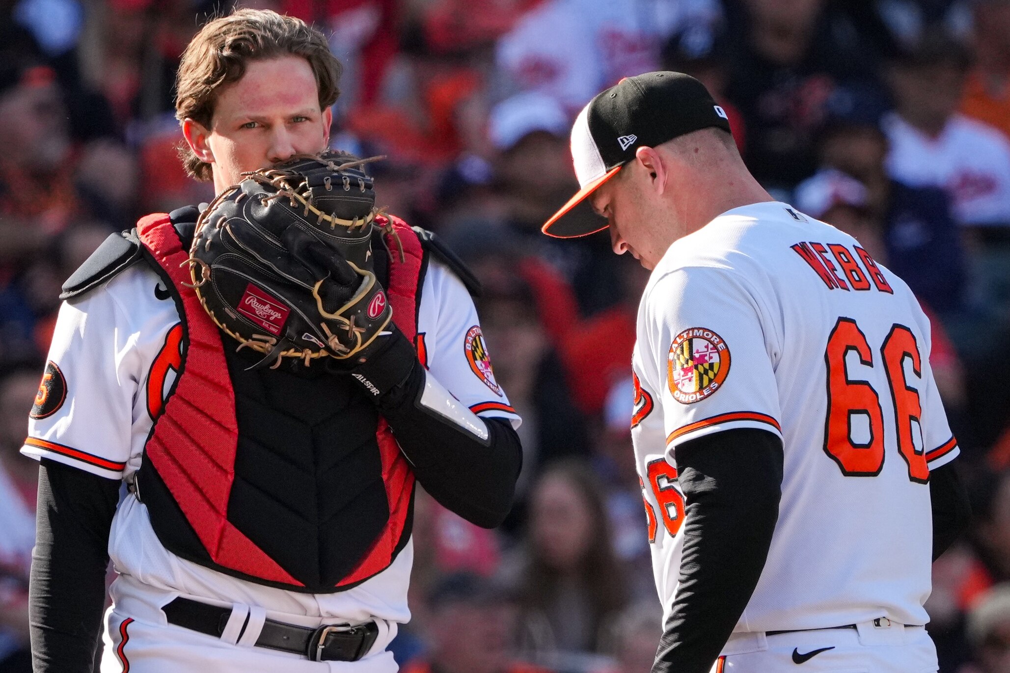 Baltimore Orioles catcher Adley Rutschman (35) and relief pitcher Jacob Webb (66) talk on the pitcher’s mound in game one of the American League Divisional Series against the Texas Rangers at Camden Yards on Saturday, October 7, 2023.