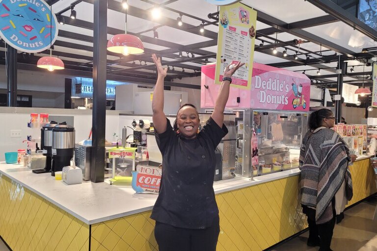 Lexington Market vendor Robin Holmes owns Debbie's Donuts, a Black and woman owned-small business.