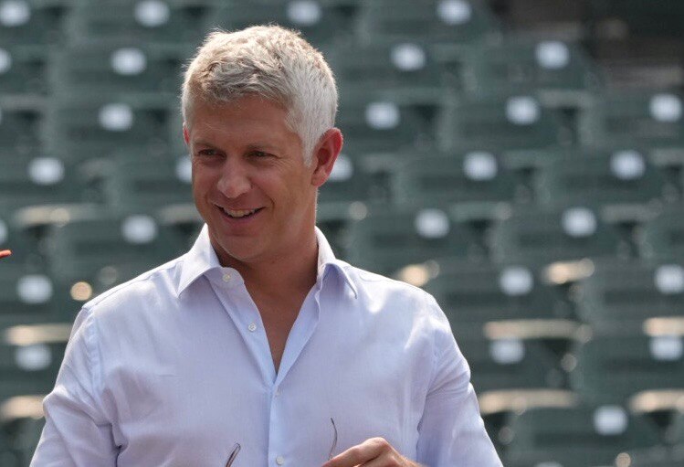 Orioles general manager and Executive Vice President Mike Elias interacts with players on the field before the Orioles vs. Dodgers game on July 18, 2023 at Camden Yards. (Kaitlin Newman/The Baltimore Banner)
