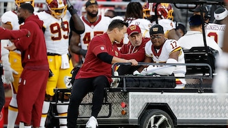 Washington Commanders wide receiver Terry McLaurin is carted off the field during the first half.