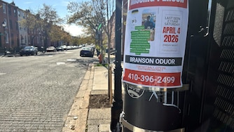 Fliers informing people about how to help with location Branson Oduor posted on poles across the Baltimore.