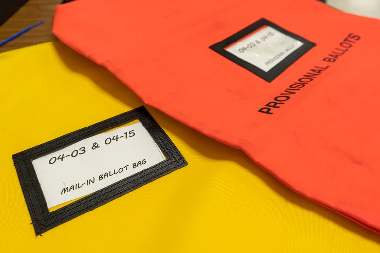 Mail-in ballot bag and provisional ballot bag at Owings Mills High School in Baltimore County.