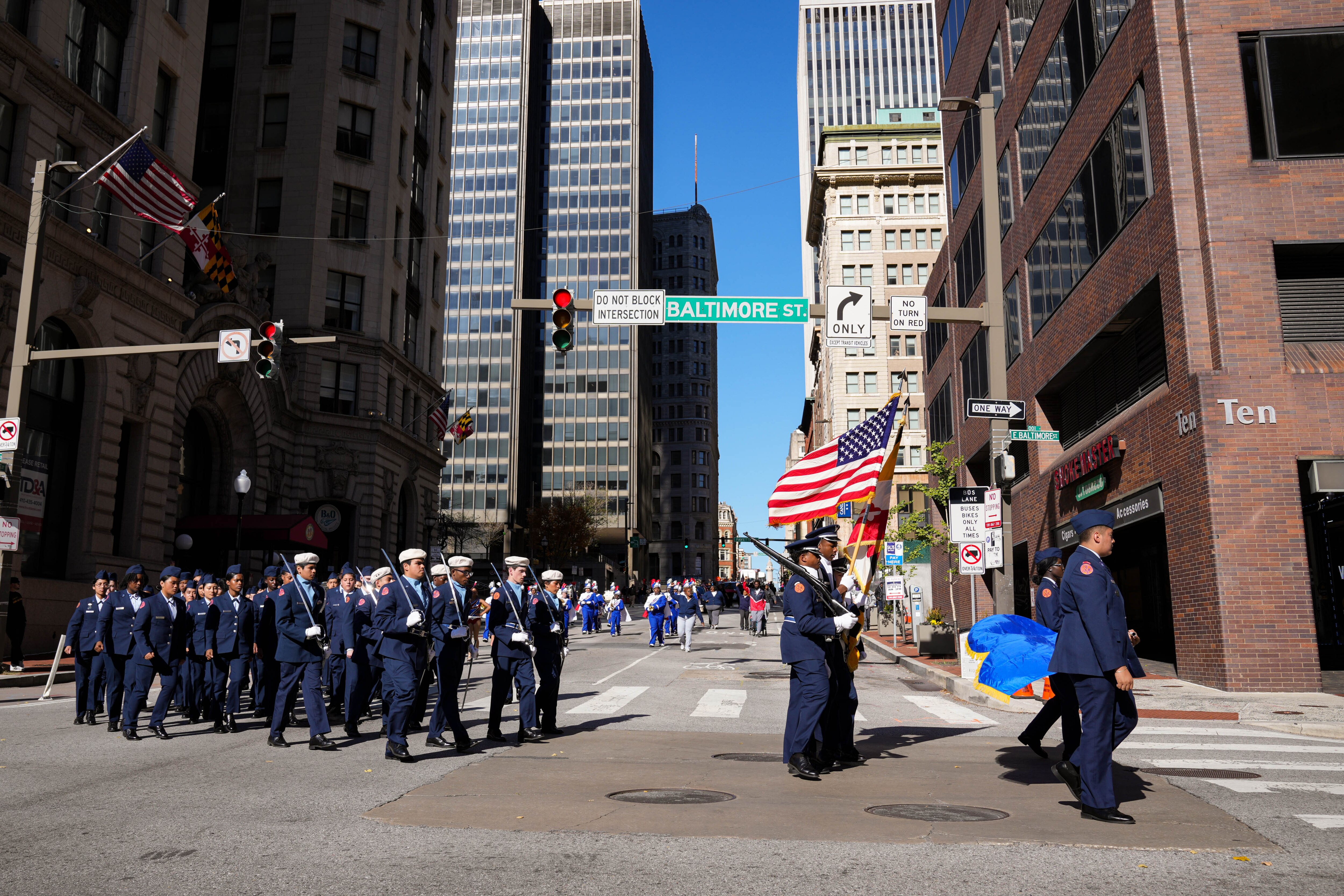 An ROTC unit marches in the Veterans Day parade in Baltimore on Saturday.