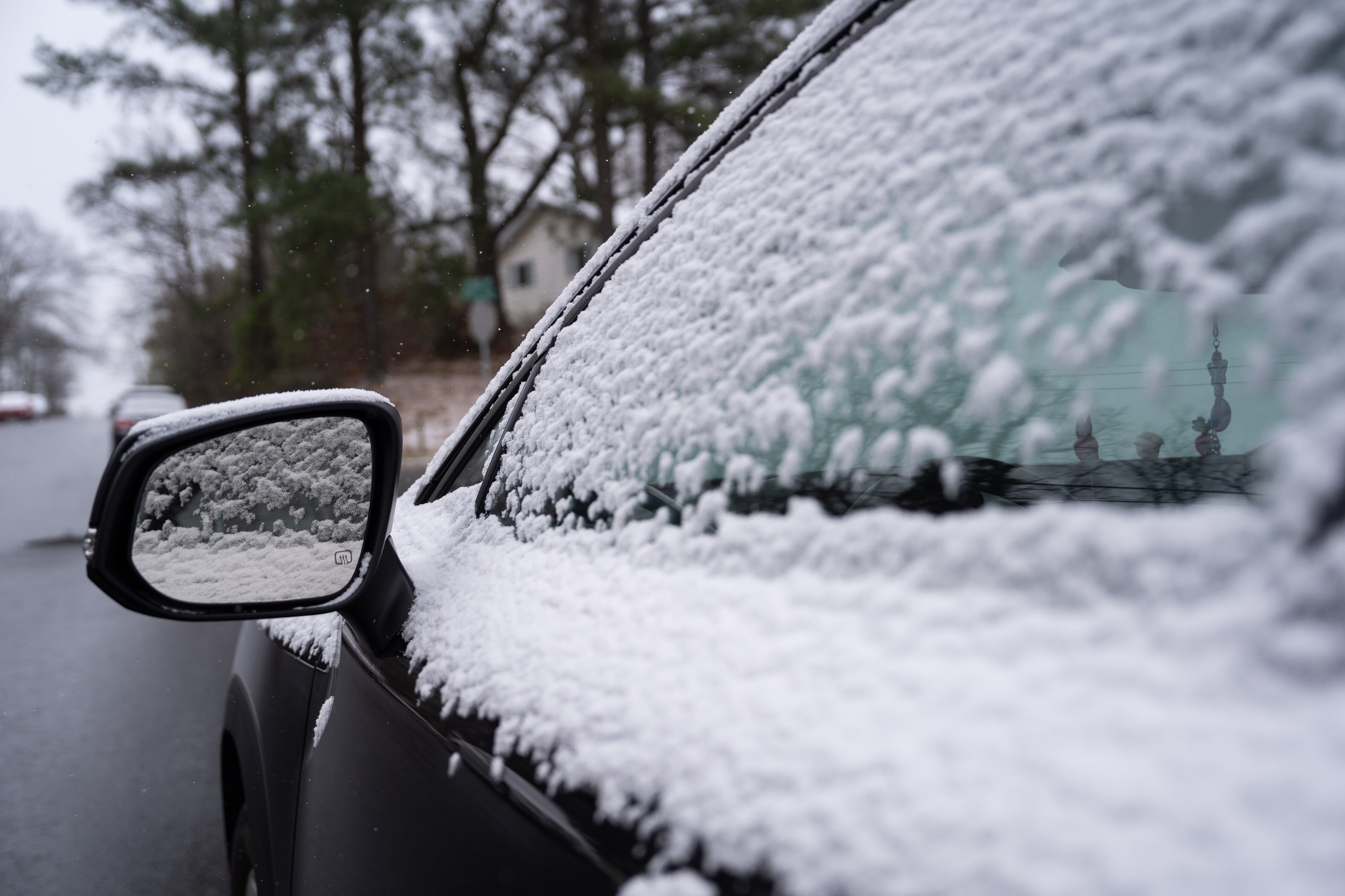 Snow covers cars in Berwyn Heights, Maryland on January 15, 2024.