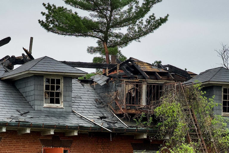 Charred remains of a fire from earlier Saturday morning. Maryland fire officials were on the scene to investigate two fires at Springfield Hospital Center in Sykesville.