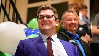 Annapolis Alderman Brooks Schandelmeier, representing Ward 5, listens during newly-elected U.S. Congresswoman Sarah Elfreth’s election night victory speech in the Atreeum at Soaring Timbers in Annapolis, Md., on Election Day, Tuesday, November 5, 2024.