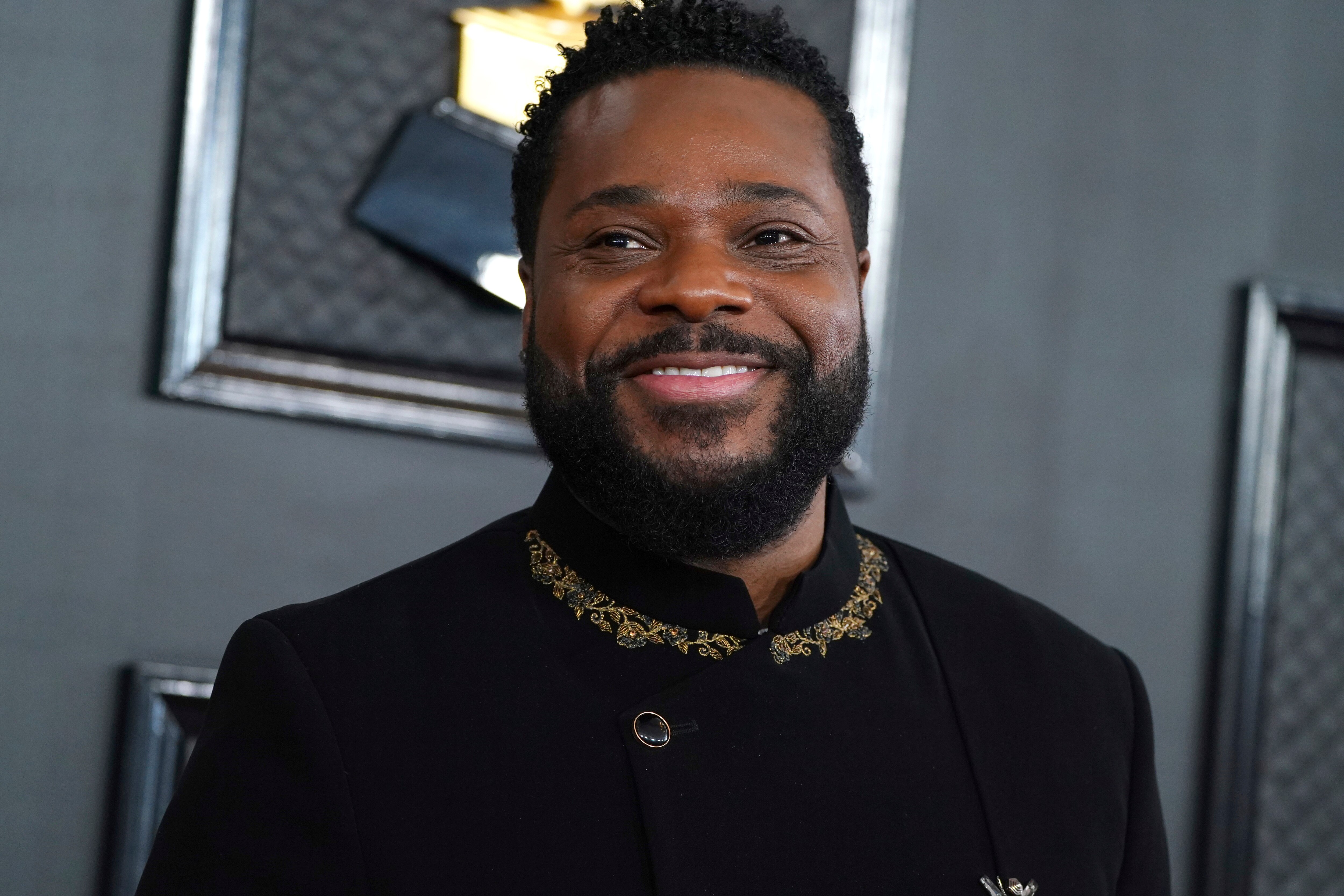 Malcolm-Jamal Warner arrives at the 65th annual Grammy Awards, Feb. 5, 2023, in Los Angeles