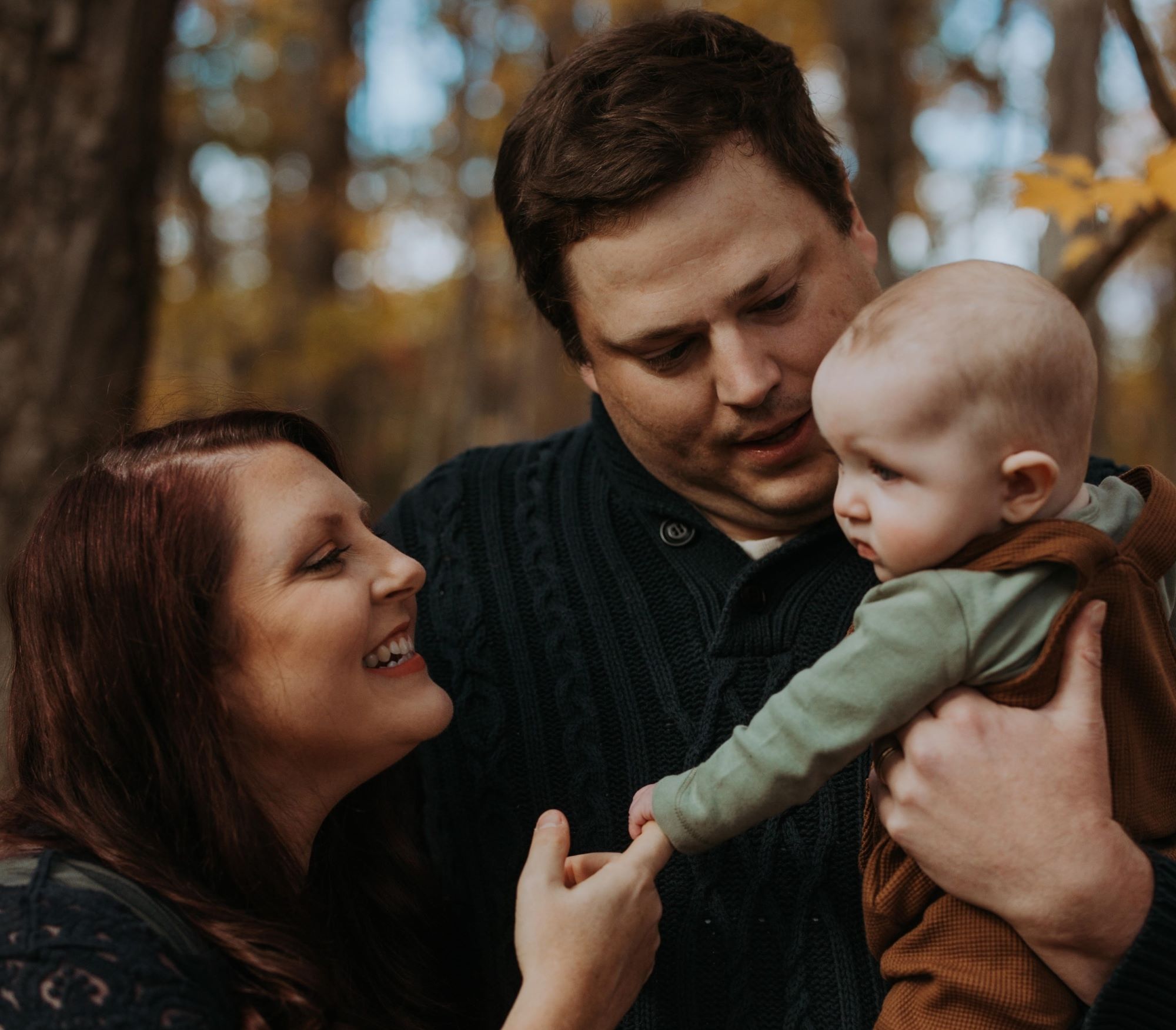 Sarah Haddaway and her husband, Noah, with their son Brooks. The Allegany County family, like many Maryland families, has struggled to find child care.