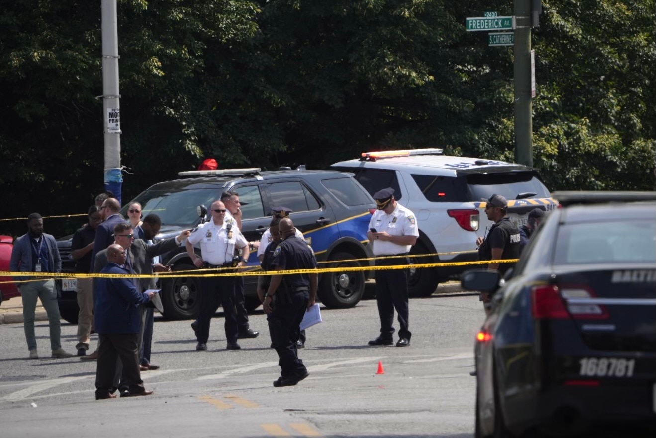 Police respond to reports of a shooting at the corner of S Catherine St. & Frederick Ave. on May 11, 2023.