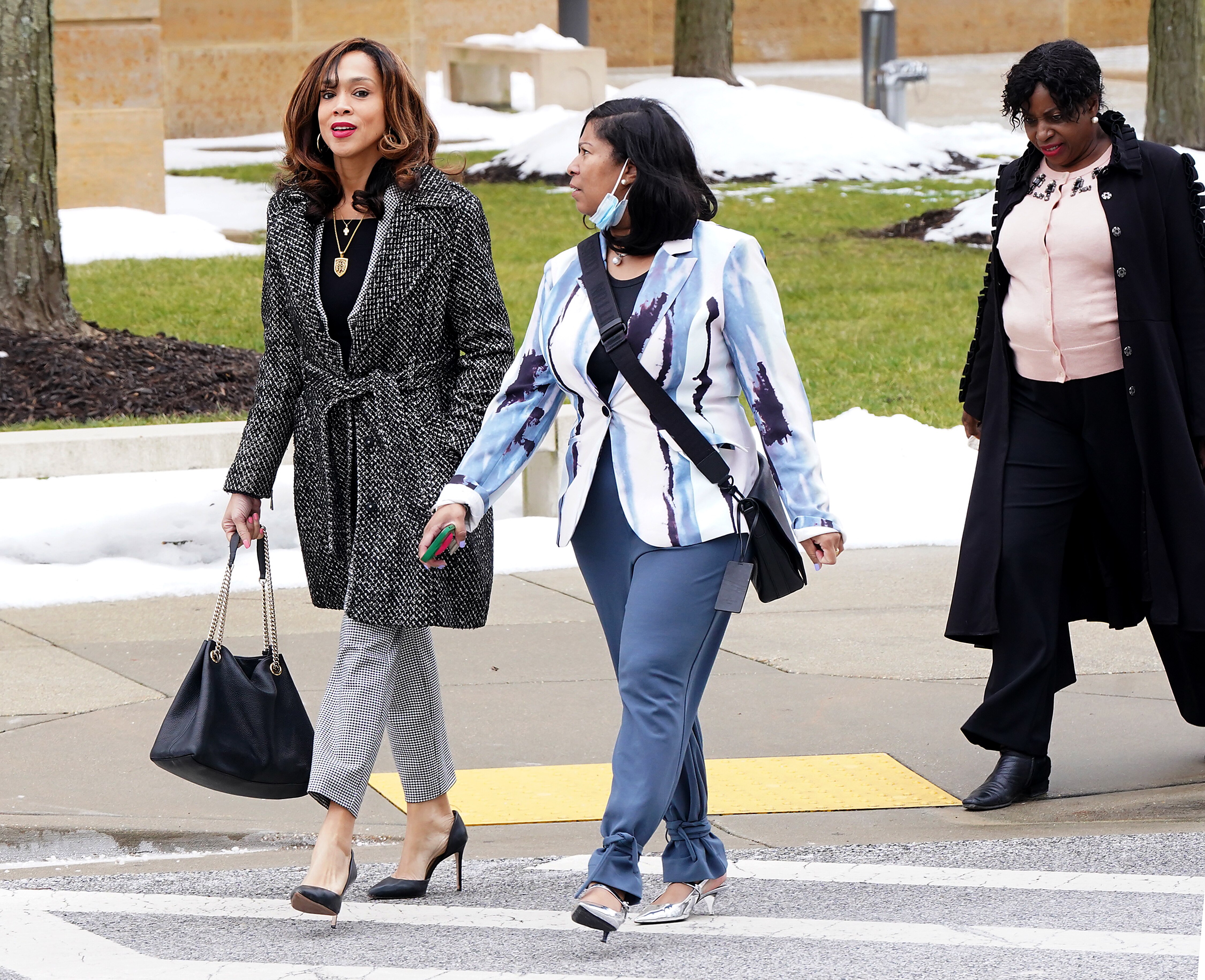 Former Baltimore State’s Attorney Marilyn Mosby, left, is standing trial in U.S. District Court in Greenbelt on two counts of making a false statement on a loan application. Federal prosecutors allege that she lied on mortgage applications related to her purchase of two luxury vacation homes in Florida.