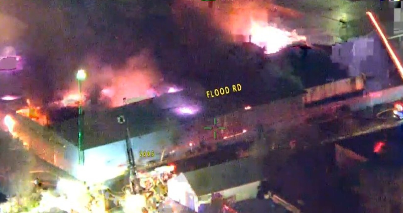 Baltimore County firefighters are battling a three-alarm blaze that broke out Saturday evening at a recycling plant in Dundalk. (Baltimore County Fire Department)
