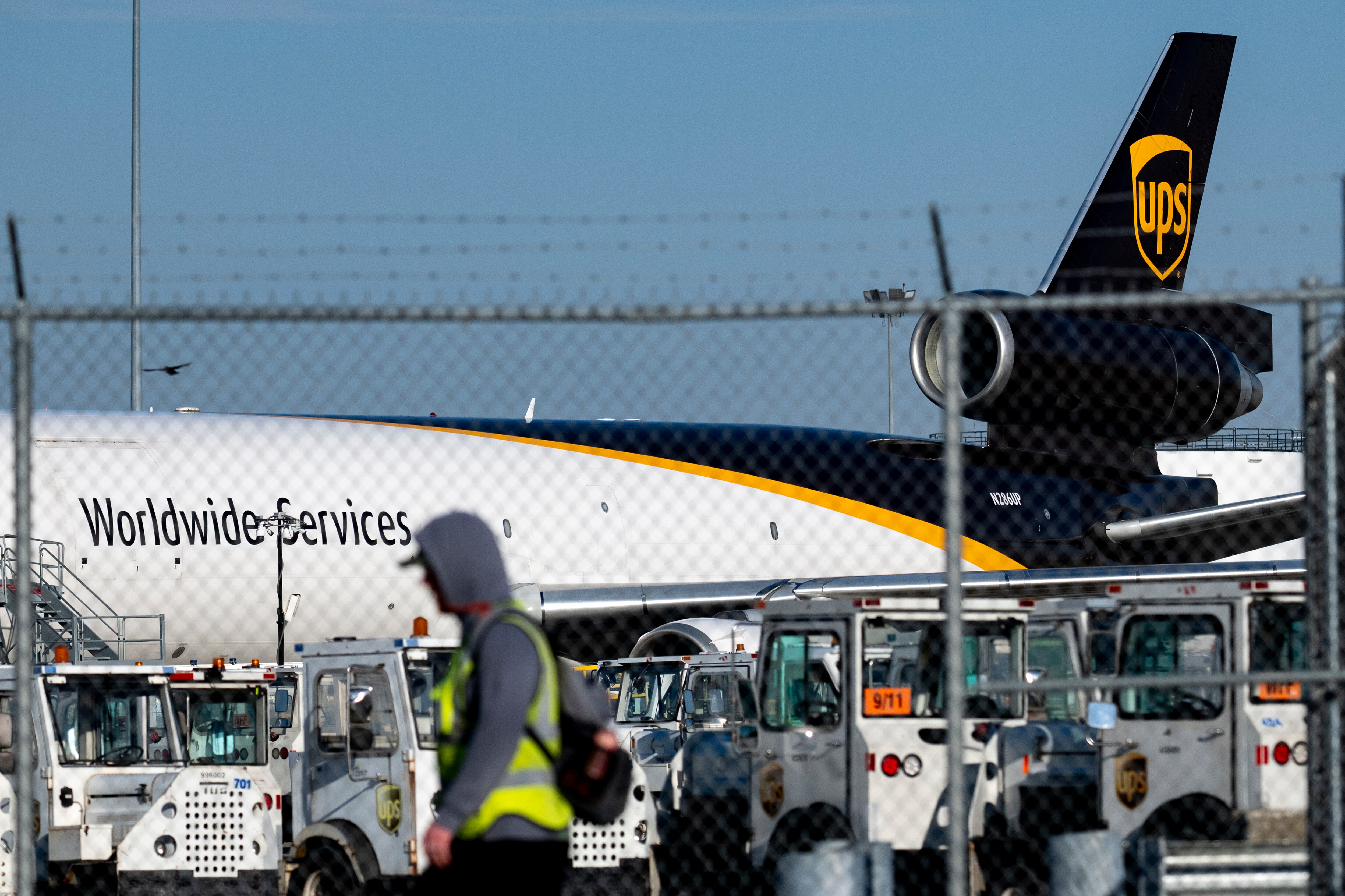 LOUISVILLE, KENTUCKY - NOVEMBER 5: A UPS MD-11 cargo plane sits idle on the tarmac on November 5, 2025 at Muhammad Ali International Airport in Louisville, Kentucky. The same type of plane crashed near the UPS facility at the airport shortly after take-off on November 4, killing at least nine people.