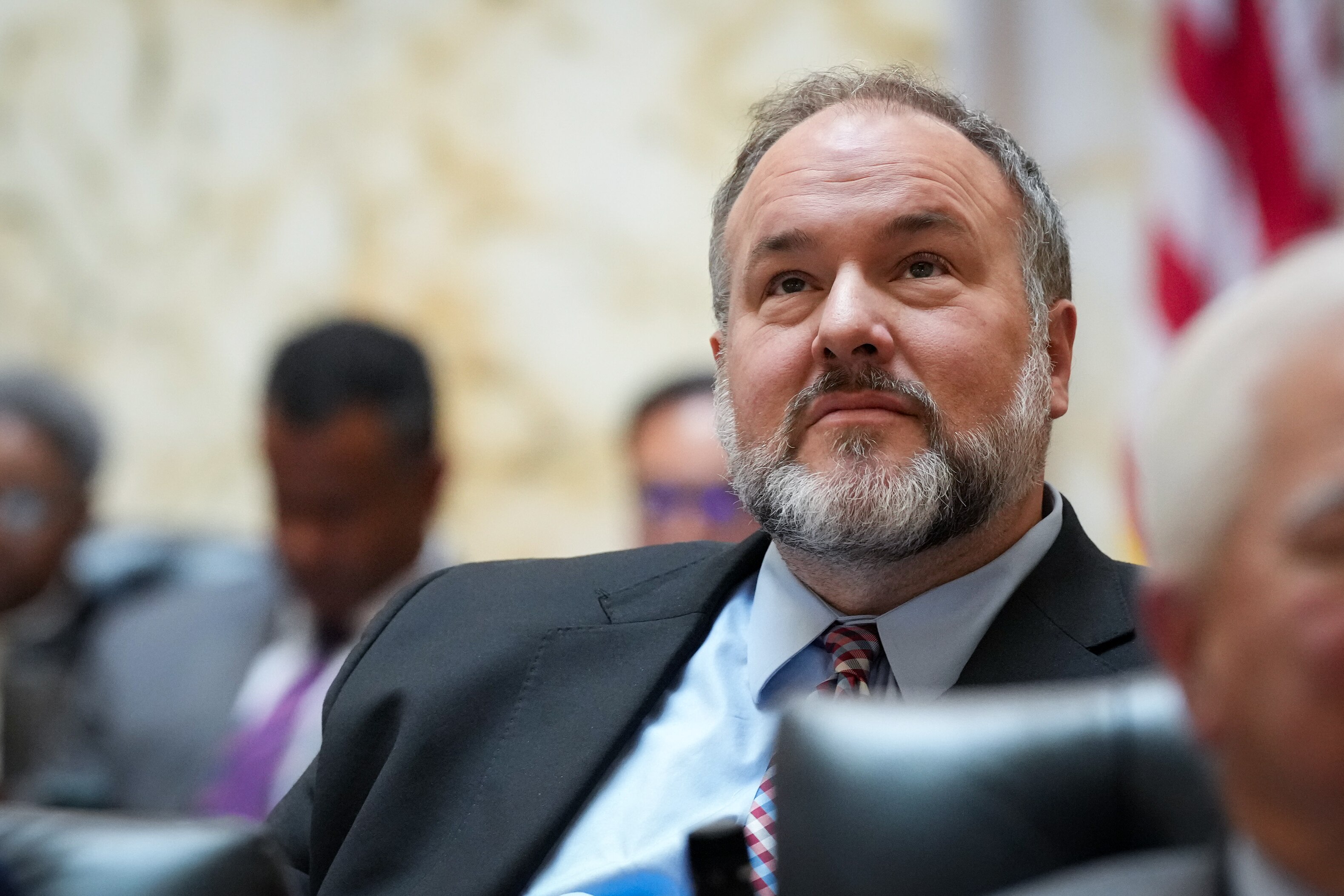 Del. Luke Clippinger, a Baltimore City Democrat, listens to floor debate at the Maryland State House on Monday, March 20, also known as Crossover Day in Annapolis. General Assembly session rules require bills to pass one chamber — either the House of Delegates or the state Senate — by the end of the day on Monday, to ensure the other chamber will consider it.