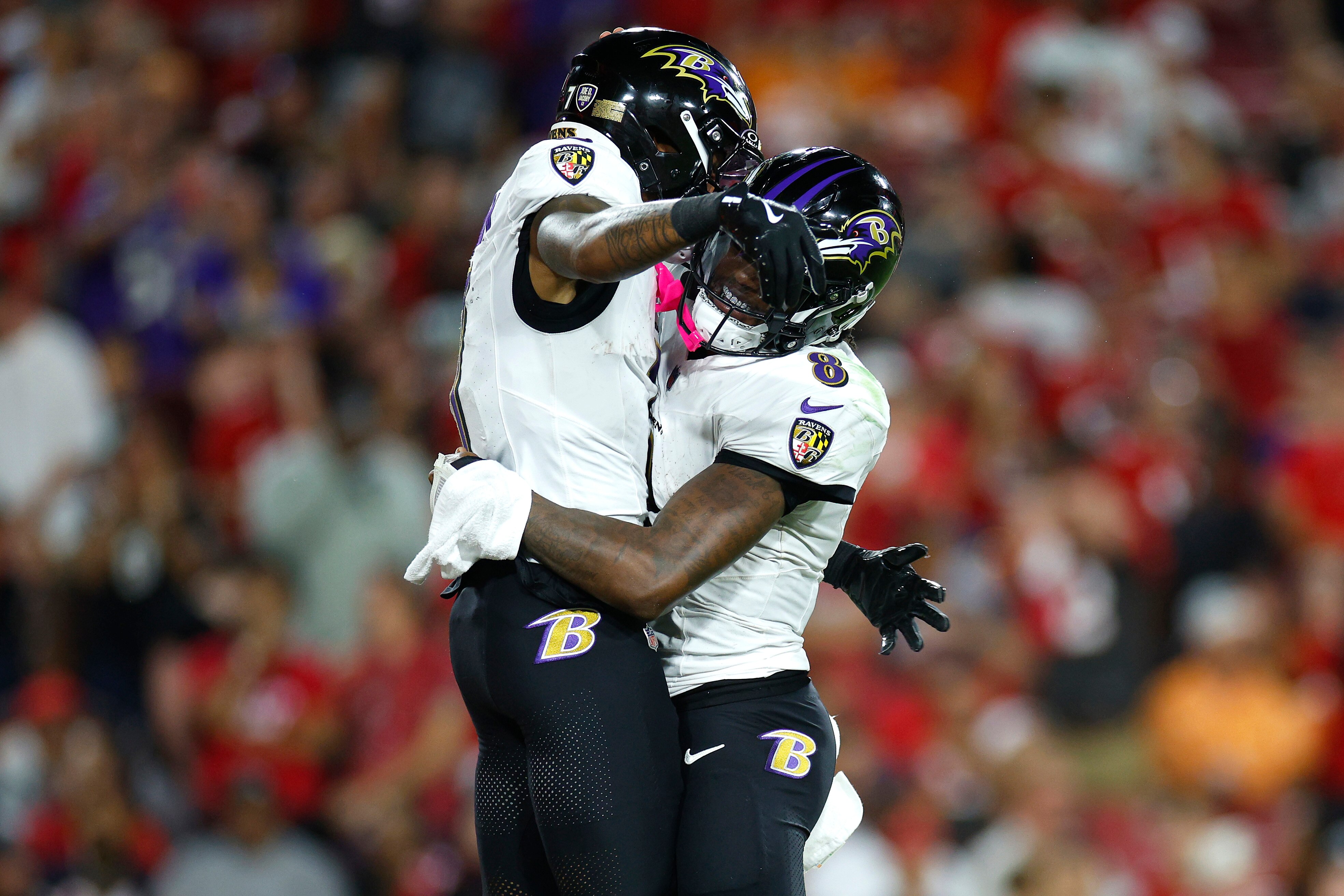 Lamar Jackson, shown celebrating a 49-yard touchdown pass to Rashod Bateman, is playing the best football of his career.