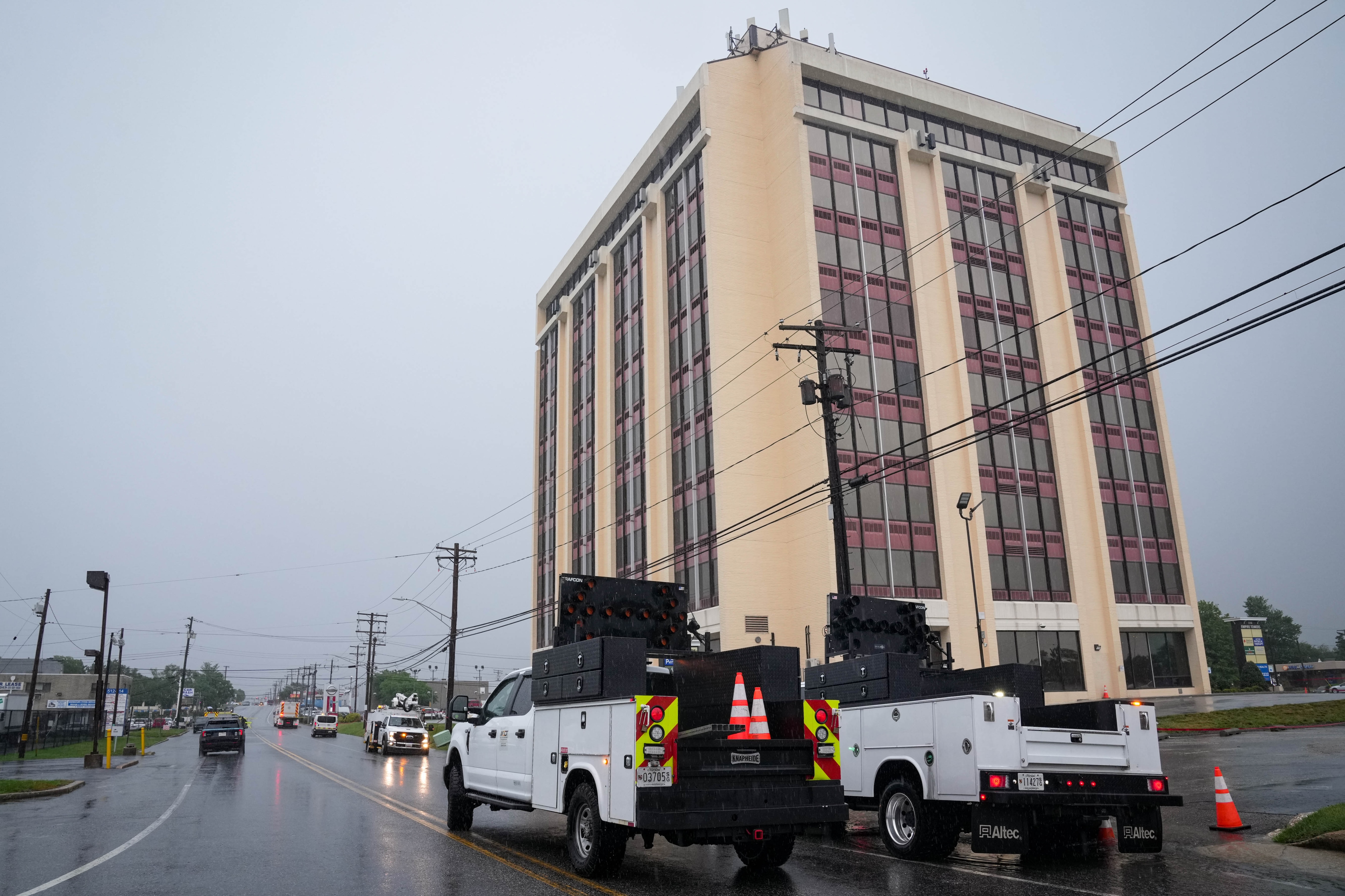 Emergency officials respond to Empire Towers, a 10-story office building, after it was evacuated for structural integrity issues in Glen Burnie on Thursday.