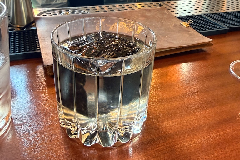 Coastin', one of the clarified cocktails on the menu at Mama Koko's, is served with a large ice cube wrapped in nori.