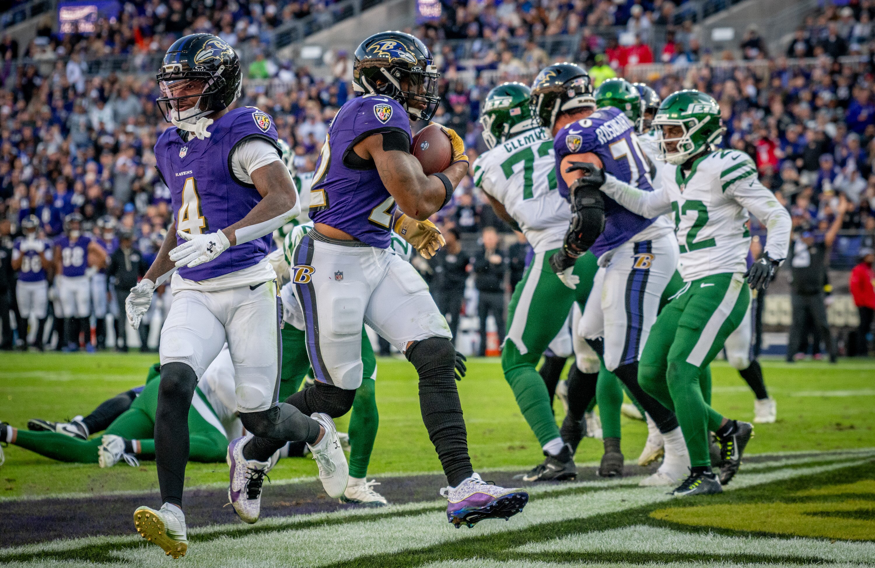 Ravens running back Derrick Henry scores one of his two third-quarter touchdowns Sunday in a 23-10 win over the Jets.