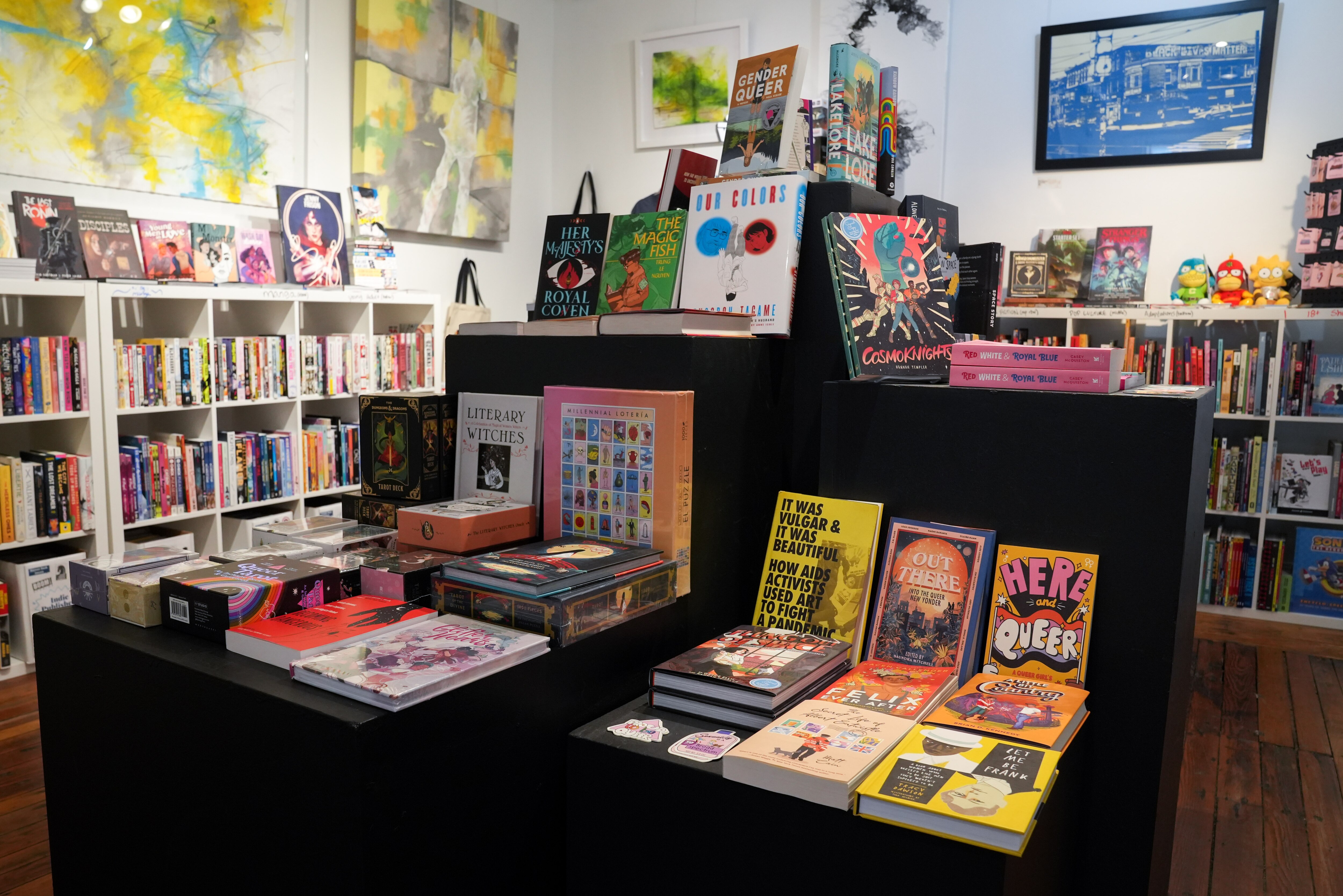 File photo from July, 2022 shows a selection of LGBTQ comics and books inside Dreamers & Make Believers in Highlandtown. Debates over the banning of books on topics such as gender and sexuality are at the center of a number of school board races in Maryland in fall, 2022.