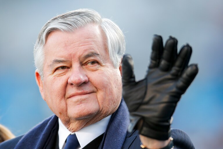 FILE - Carolina Panthers team owner Jerry Richardson drives around the field on his golf cart before his team takes on the Tampa Bay Buccaneers during an NFL game in Charlotte, N.C. on Sunday, Jan. 3, 2016. Richardson, the Carolina Panthers founder and for years one of the NFL’s most influential owners until a scandal forced him to sell the team, has died. He was 86. Richardson died peacefully Wednesday night, March 1, 2023, at his Charlotte home, the team said in a statement.