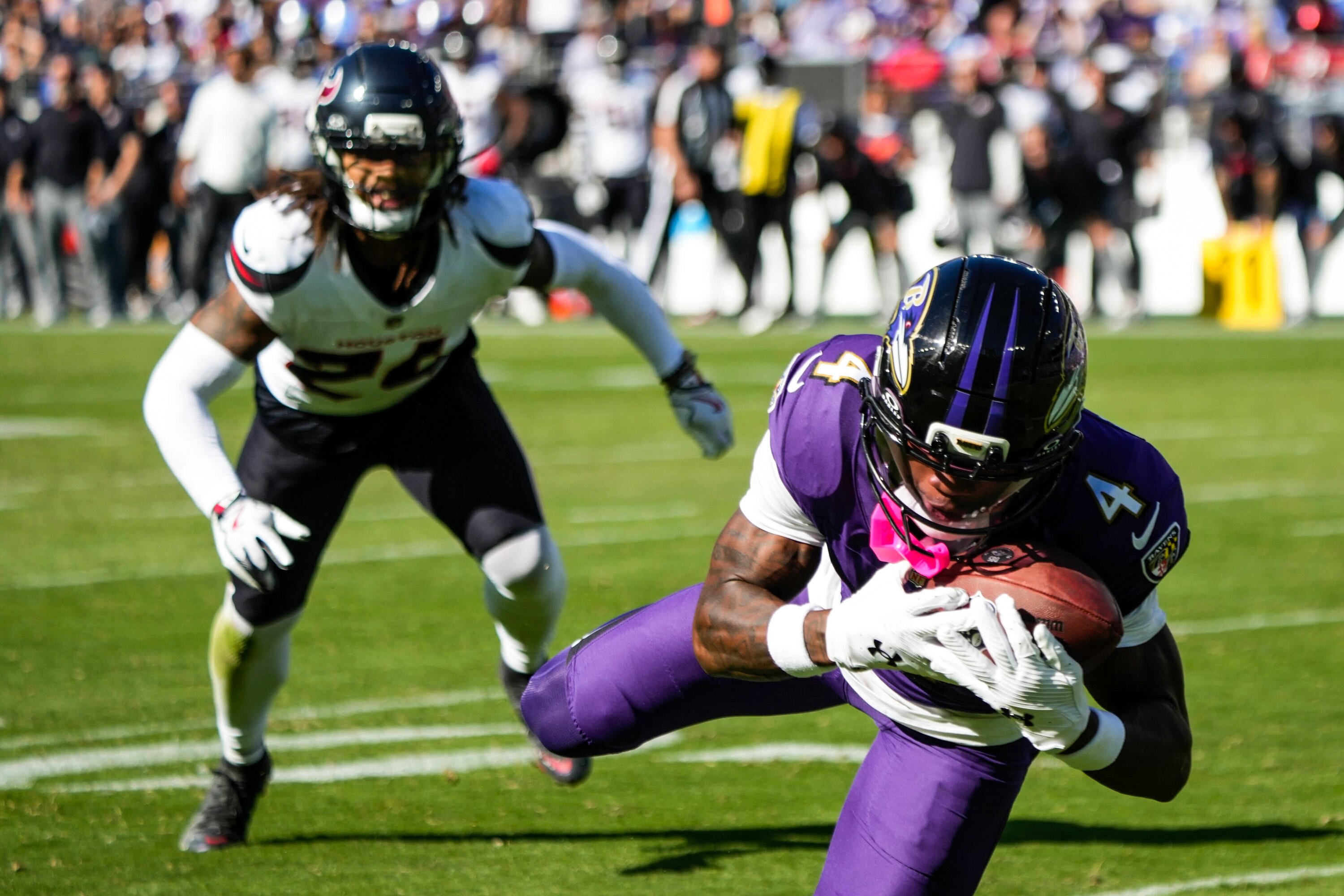 Baltimore Ravens wide receiver Zay Flowers makes a catch in the third quarter of Sunday's game against the Houston Texans at M&T Bank Stadium.
