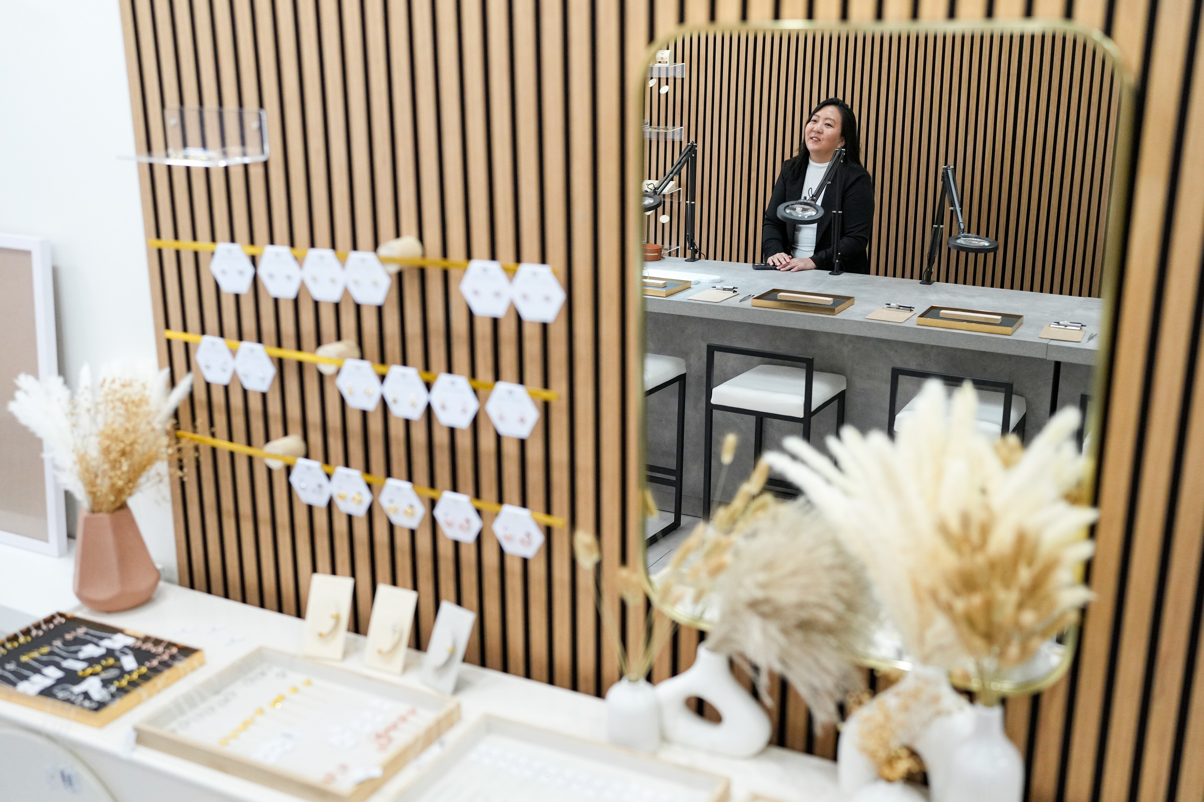 Eunie Cho poses for a portrait in her jewelry store, Iggy North, in Baltimore, Md. on Tuesday, November 26, 2024.