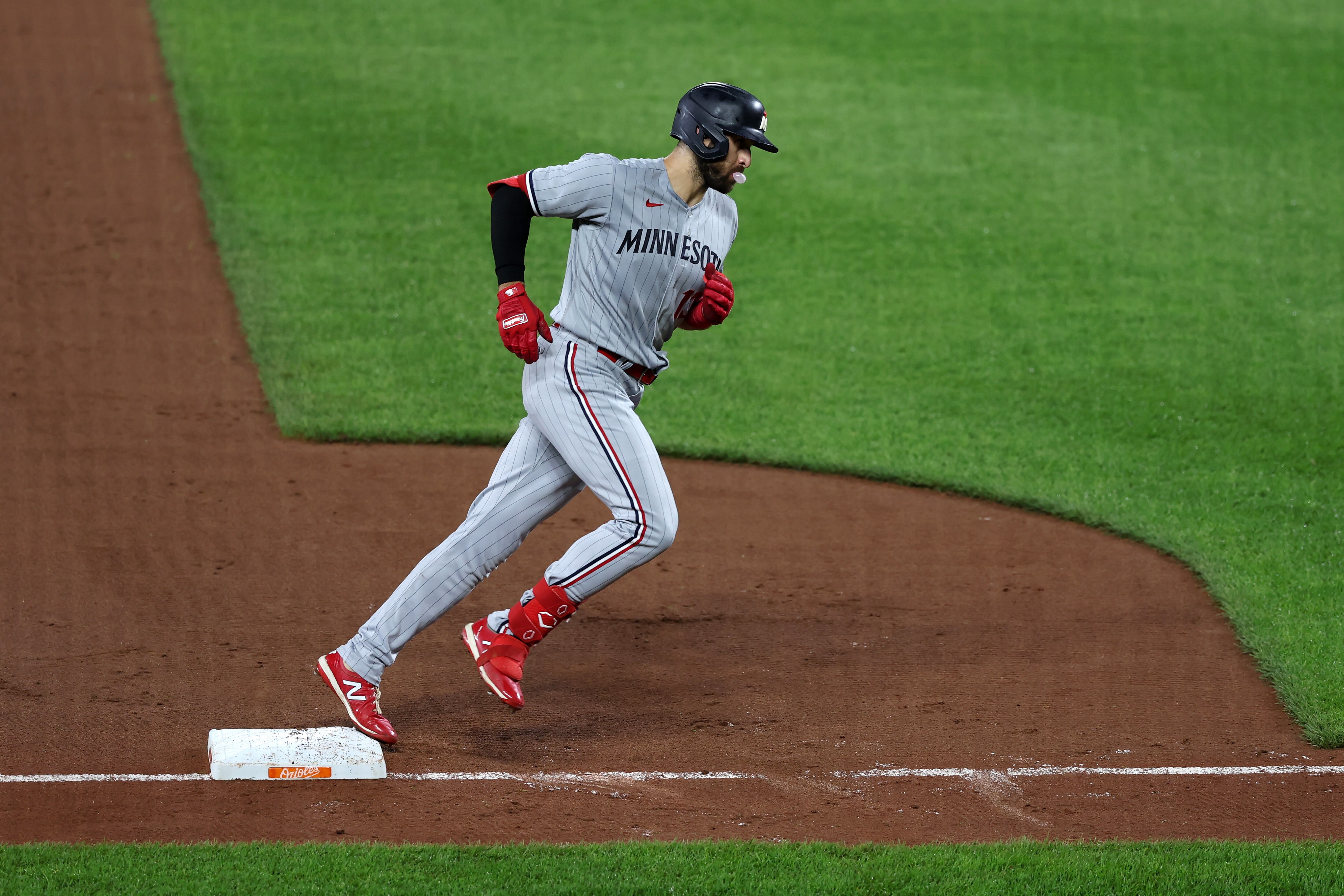 Joey Gallo of the Twins rounds third after hitting a solo home run against the Orioles' Dean Kremer during the second inning of Minnesota's 8-1 win Friday night at Camden Yards.