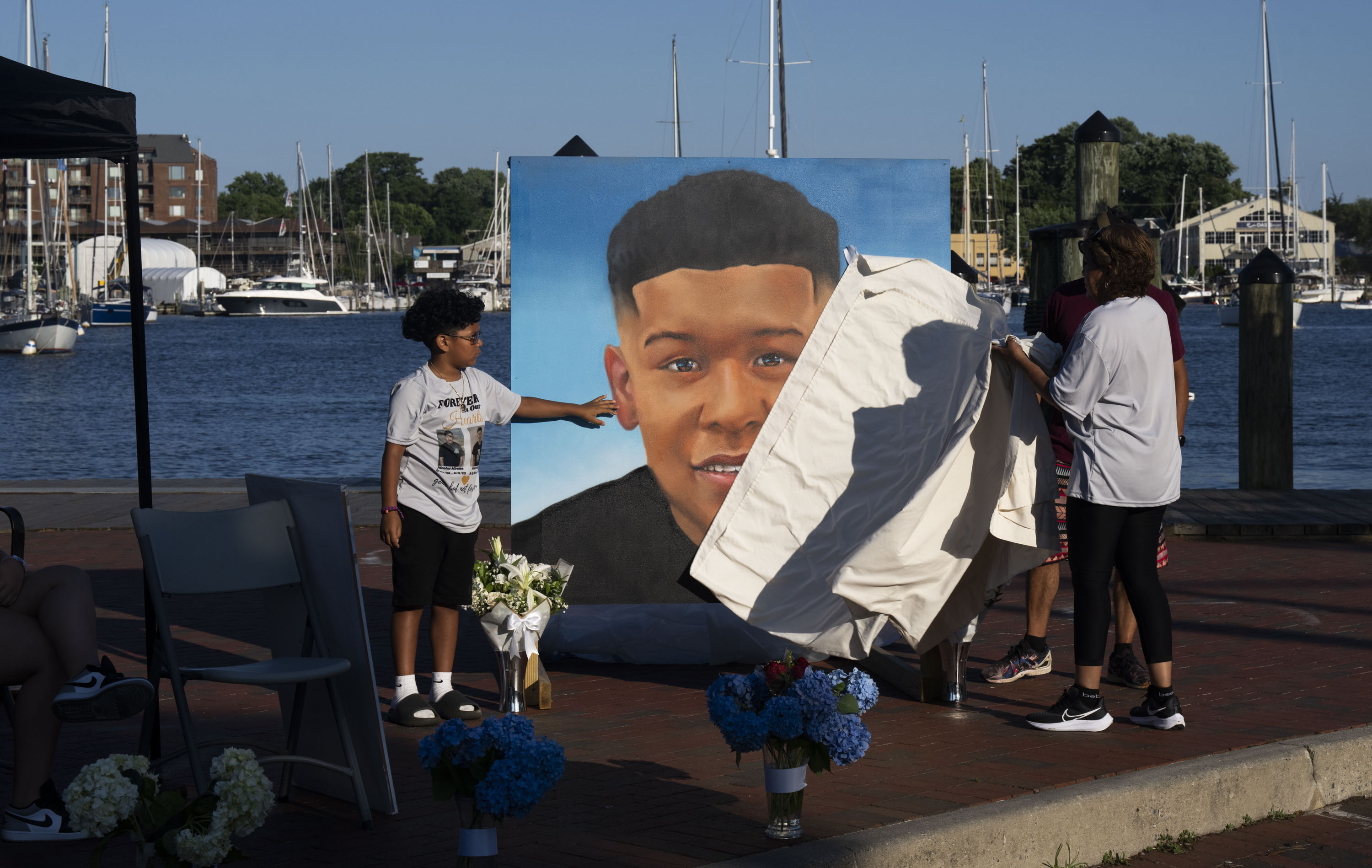 A portrait of Mario Mireles Ruiz, by Jeff Huntington is unveiled on the one year anniversary of his death on June 11, 2024.