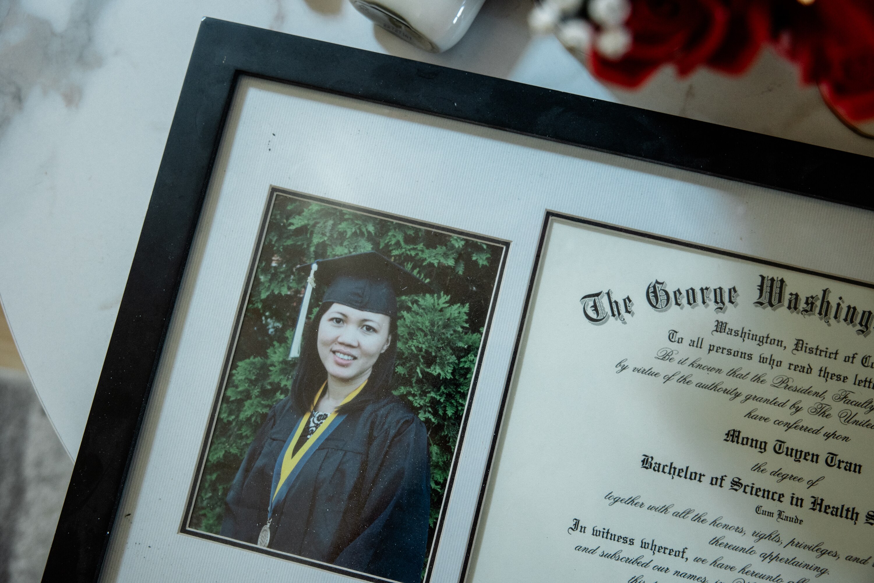 Mong “Melissa” Tuyen Thi Tran’s university diploma in her Hagerstown home. The mother of four is set to be deported to Vietnam as soon as Monday.