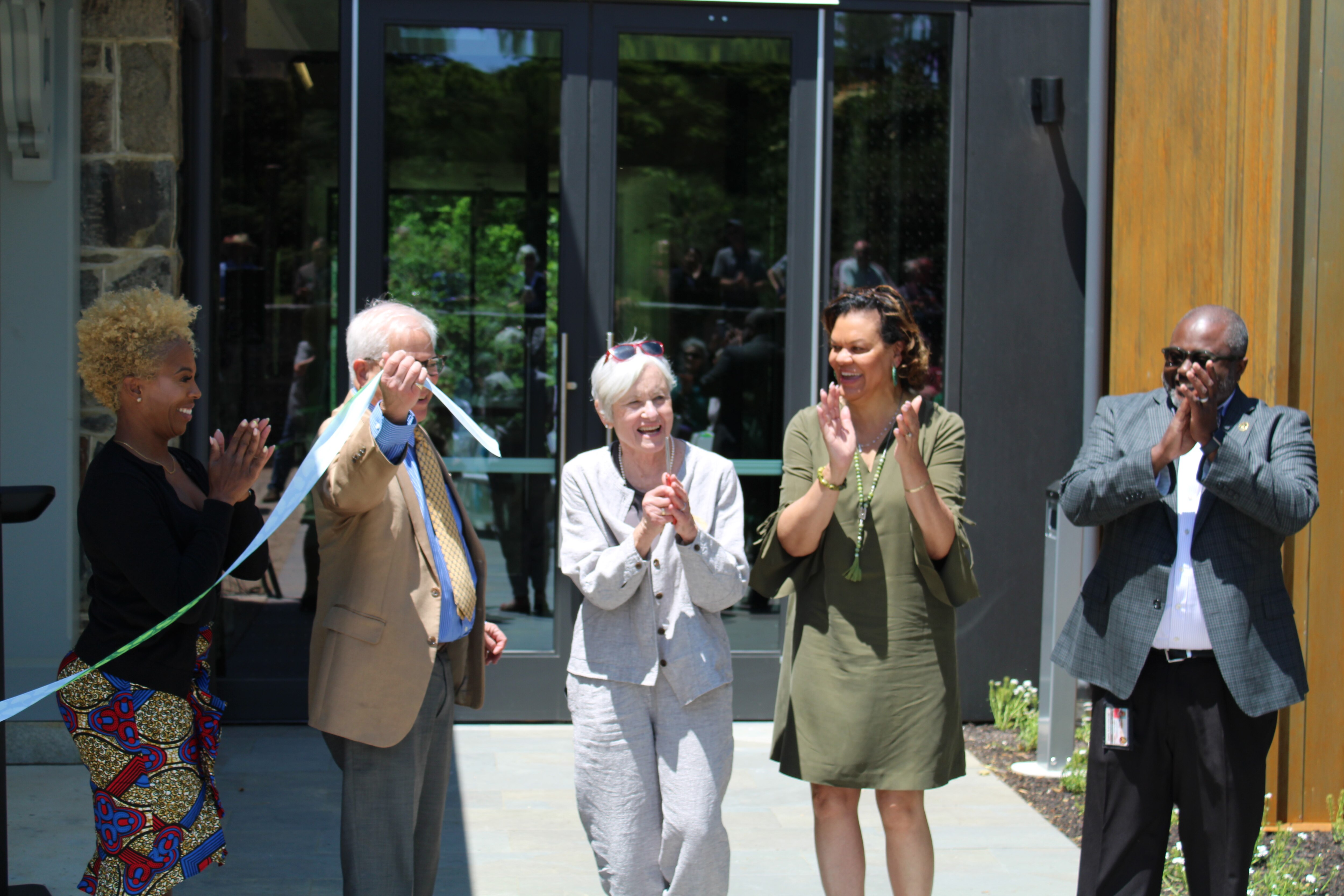 Deputy Mayor Letitia Dzirasa, Delegate Sandy Rosenberg, former executive director of Cylburn Arboretum Friends Patricia Foster, Councilwoman Sharon Middleton and Director of Baltimore City Recreation and Parks Reginald Moore celebrate a ribbon cutting for the Nature Education Center at Cylburn Arboretum.
