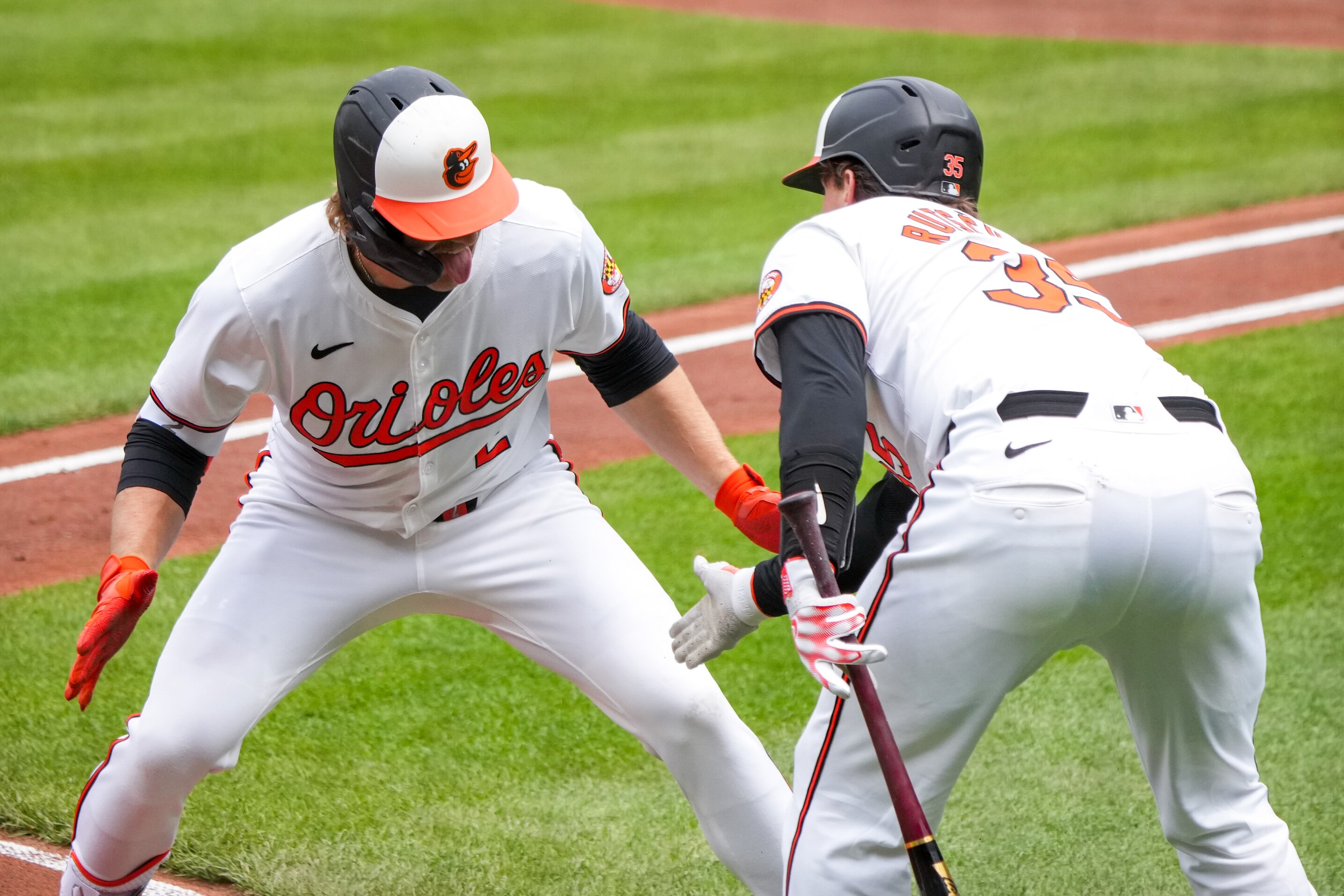 Orioles shortstop Gunnar Henderson (left) and catcher Adley Rutschman won fan voting to start the All-Star Game in Texas.
