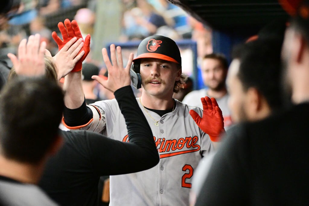 Gunnar Henderson, #2 of the Baltimore Orioles, celebrates with teammates in the dugout after hitting a home run in the first inning against the Tampa Bay Rays at Tropicana Field on June 10, 2024 in St Petersburg, Florida. (Photo by Julio Aguilar/Getty Images)