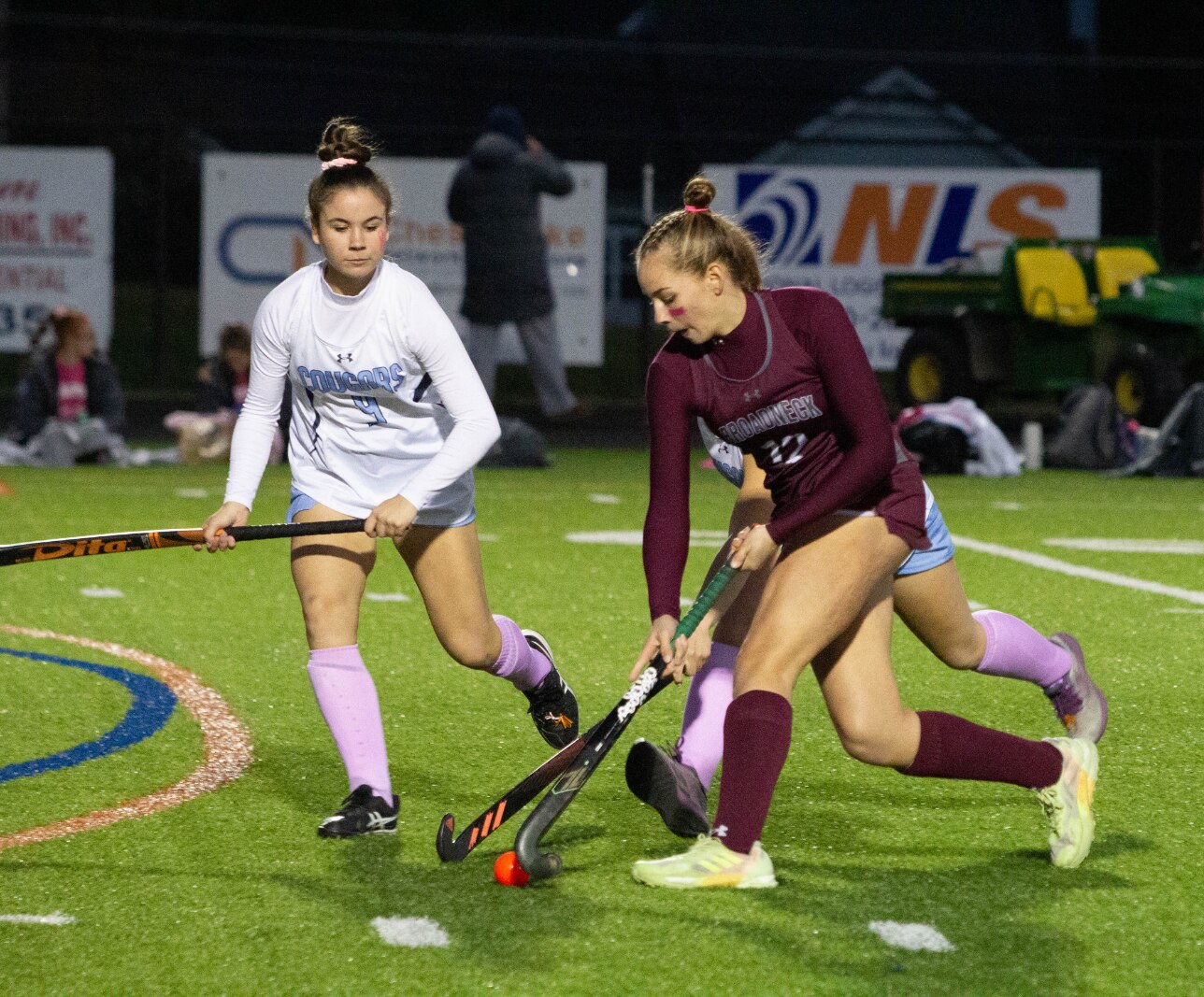 Chloe Page (with ball) is part of a talented Broadneck field hockey team that's undefeated and ranked No. 1 in the Baltimore area. The Bruins, who play Monday evening in the Anne Arundel County championship game, are considered the favorite to win the Class 4A state crown.