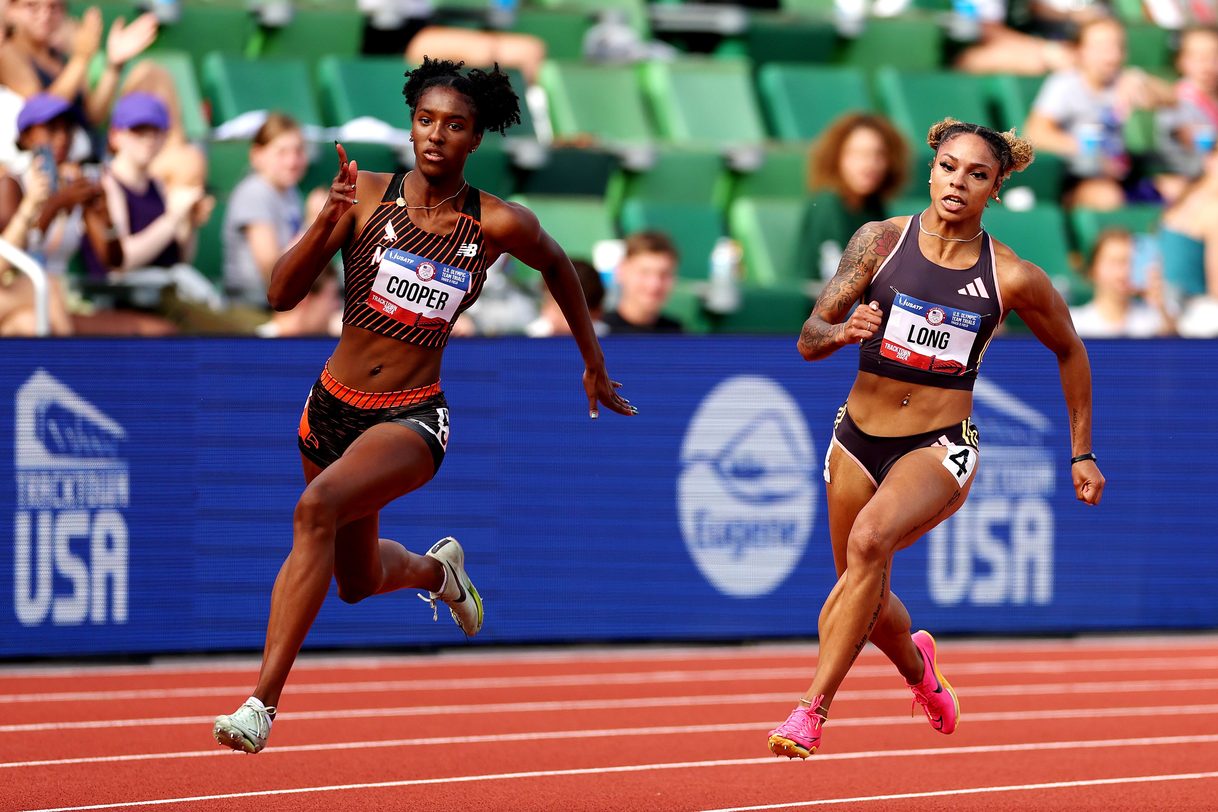 EUGENE, OREGON - JUNE 27: Elise Cooper and McKenzie Long compete in the first round of the women's 200 meters on Day Seven of the 2024 U.S. Olympic Team Track & Field Trials at Hayward Field on June 27, 2024 in Eugene, Oregon.