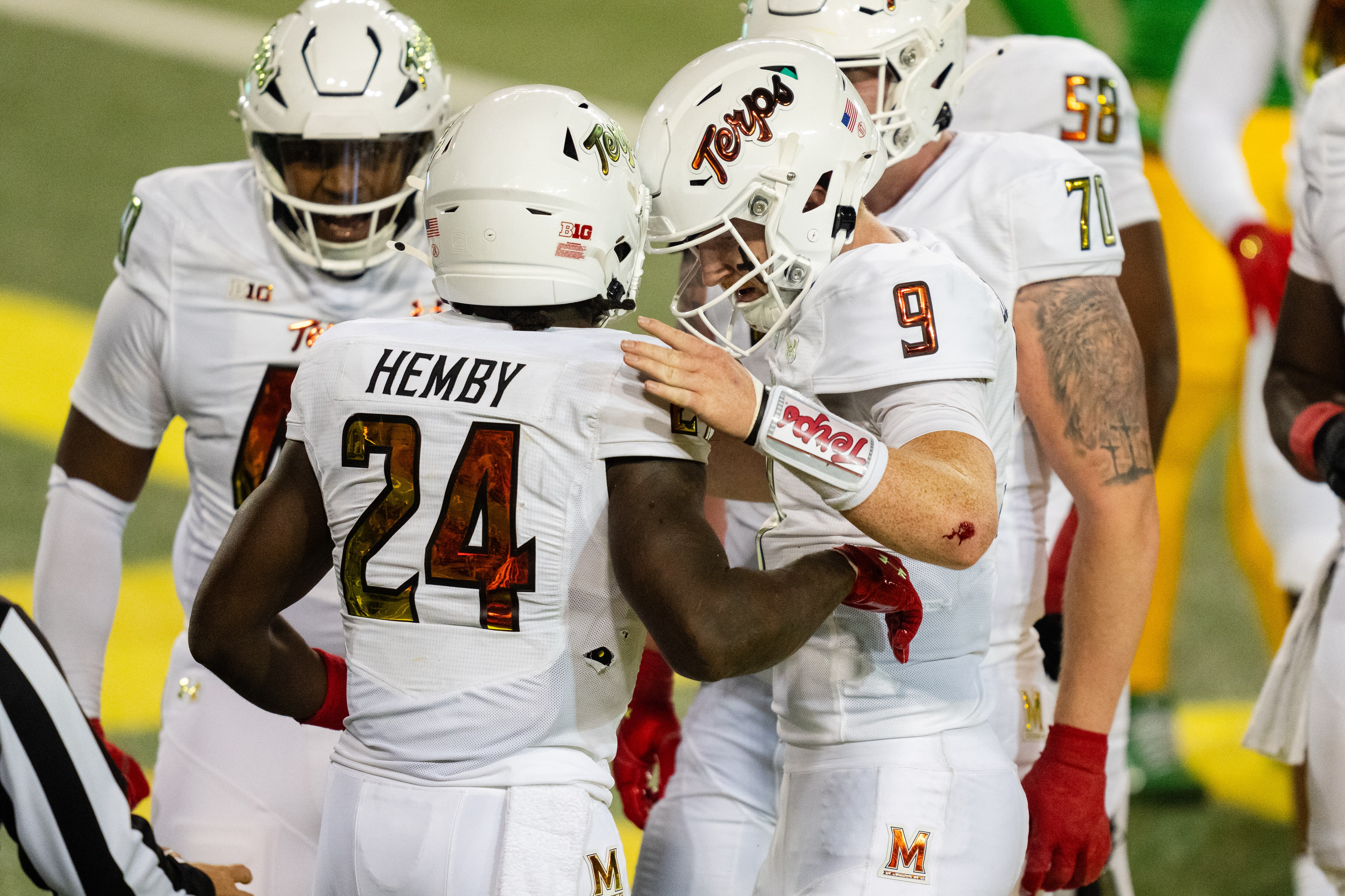 Maryland quarterback Billy Edwards Jr. (9) celebrates with running back Roman Hemby after a first-half touchdown run by Hemby.