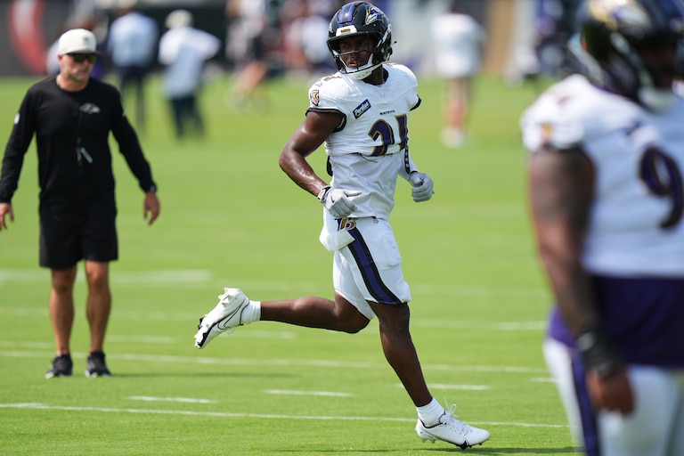 Baltimore Ravens safety Jaylinn Hawkins (21) works out during the team's NFL football training camp, Tuesday, Aug. 11, 2026, at the Under Armour Performance Center in Owings Mills, Md. (AP Photo/Stephanie Scarbrough)