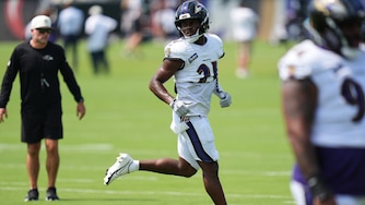 Baltimore Ravens safety Jaylinn Hawkins (21) works out during the team's NFL football training camp, Tuesday, Aug. 11, 2026, at the Under Armour Performance Center in Owings Mills, Md. (AP Photo/Stephanie Scarbrough)
